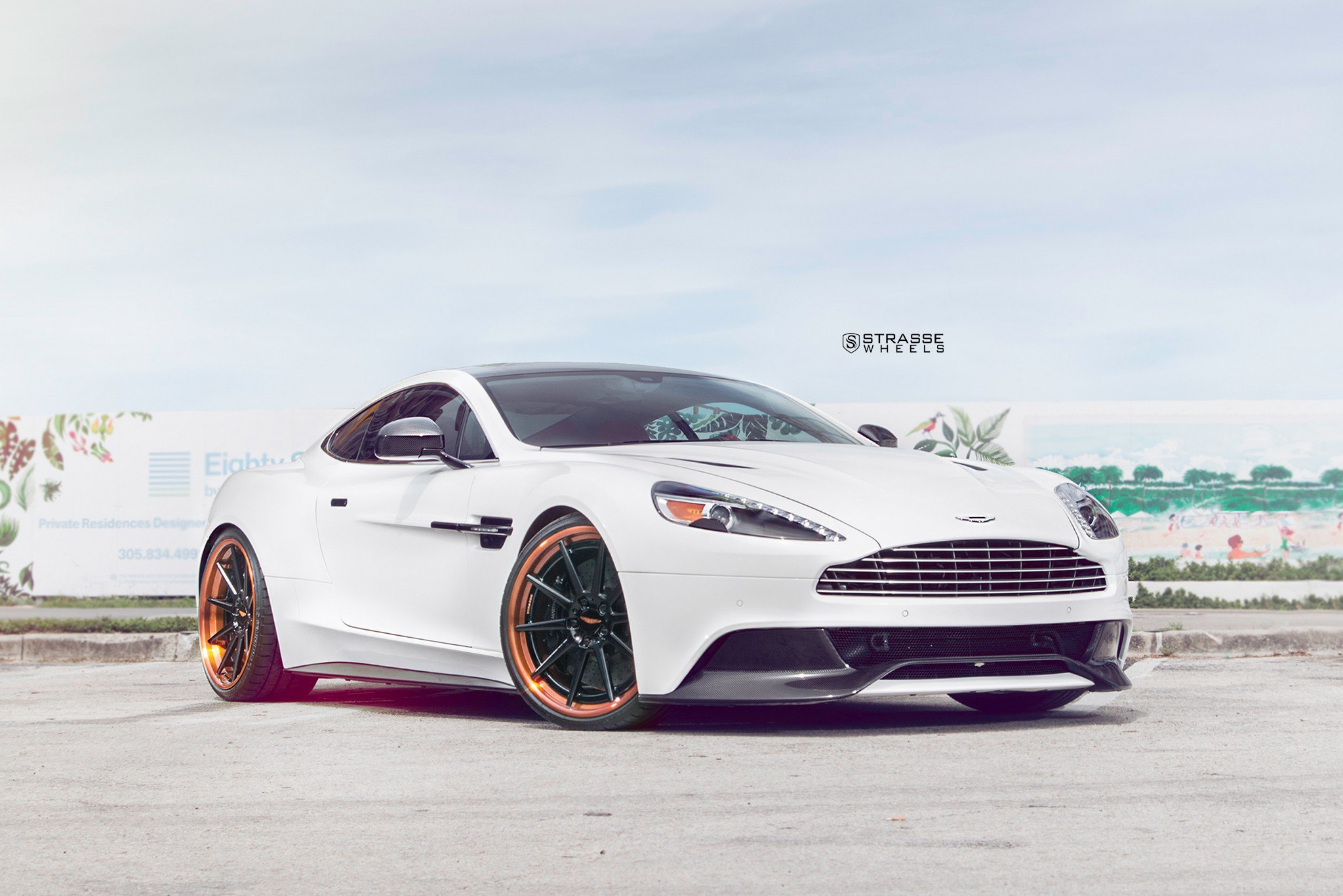 Carbon Fiber Front Lip on White Aston Martin Vanquish - Photo by Strasse Wheels