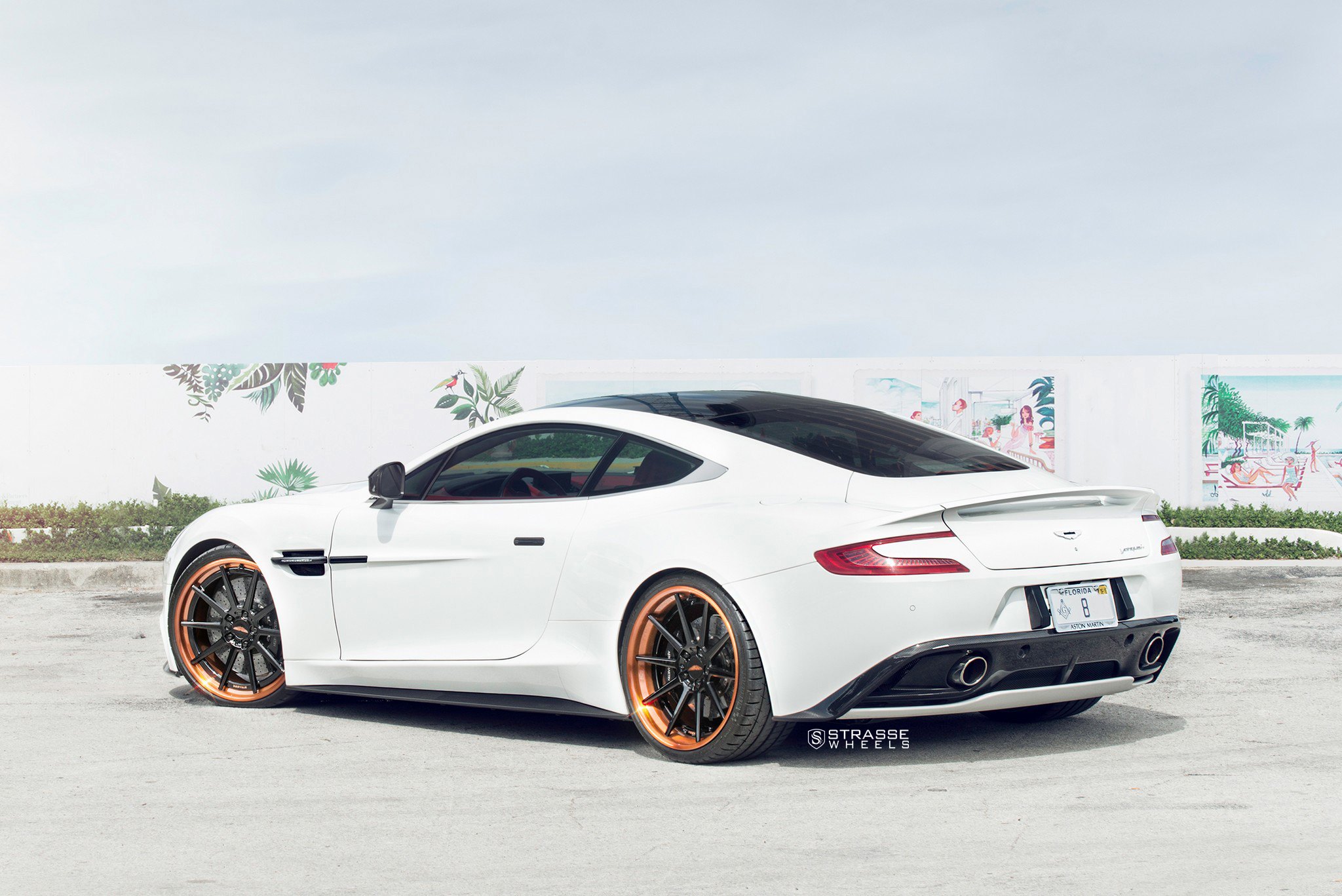 White Aston Martin Vanquish with Custom Style Rear Spoiler - Photo by Strasse Wheels