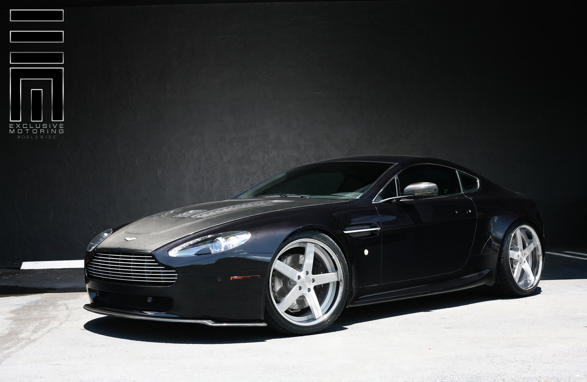Black Aston Martin Vantage with contrasting Silver Wheels - Photo by Exclusive Motoring