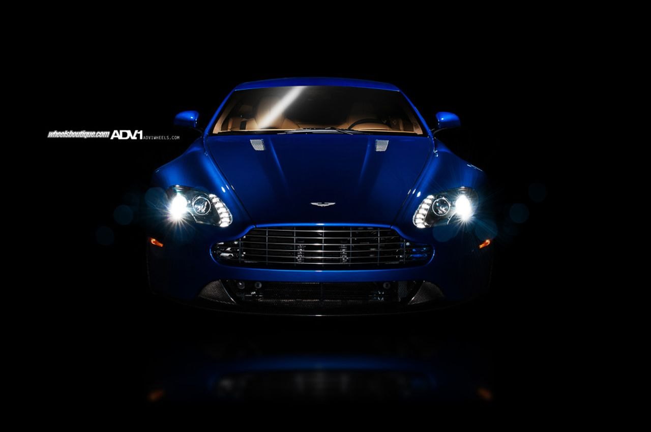 LED Headlights on Custom Blue Aston Martin Vantage - Photo by ADV.1