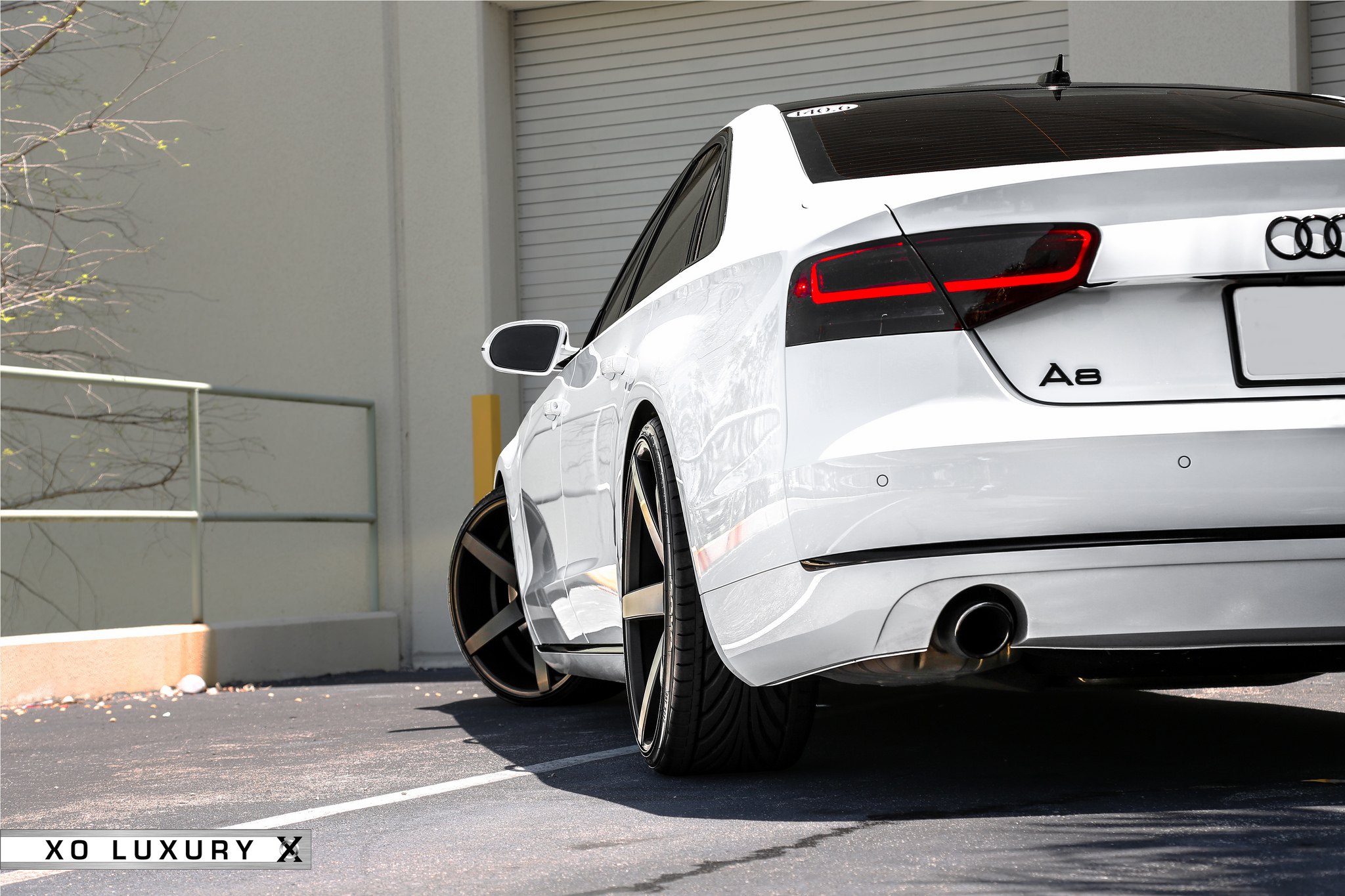 Audi A6 Smoged LED Taillights - Photo by XO Luxury