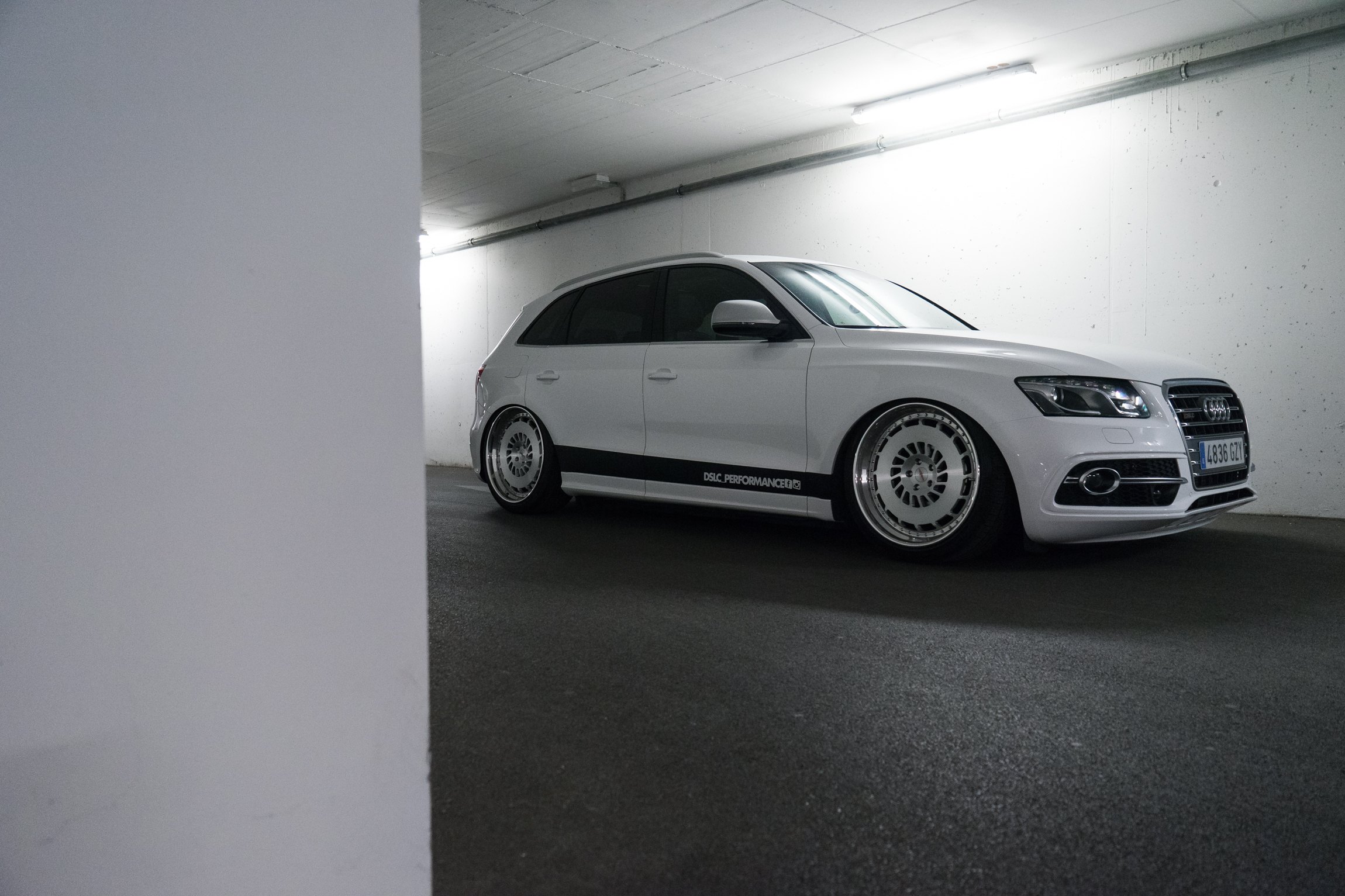 Aftermarket Headlights on White Audi Q5 - Photo by Rotiform