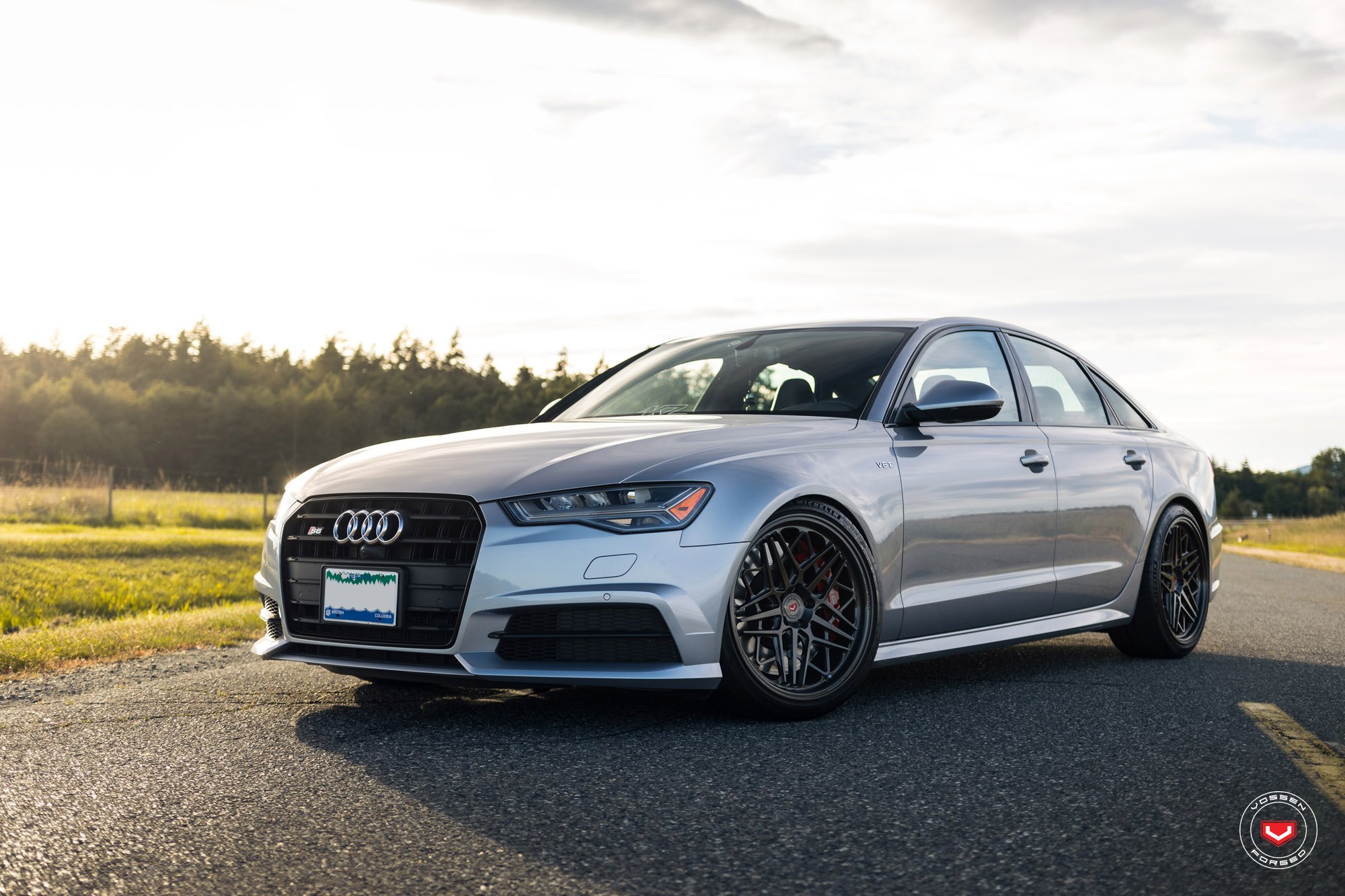 Silver Audi S6 with Aftermarket Projector Headlights - Photo by Vossen