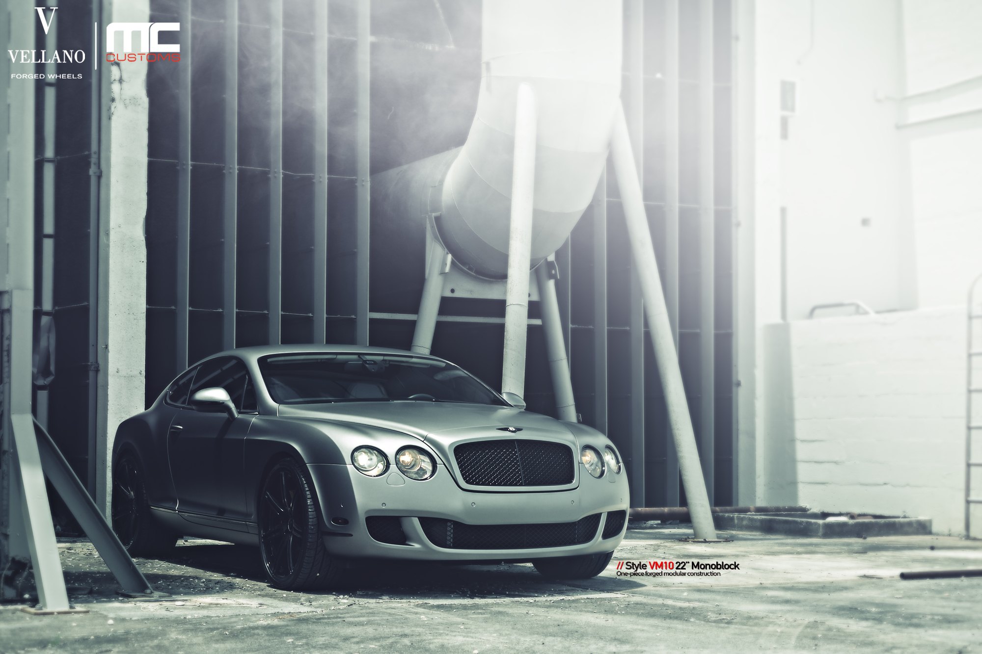 Gray Bentley Continental with Blacked Out Mesh Grille - Photo by Vellano