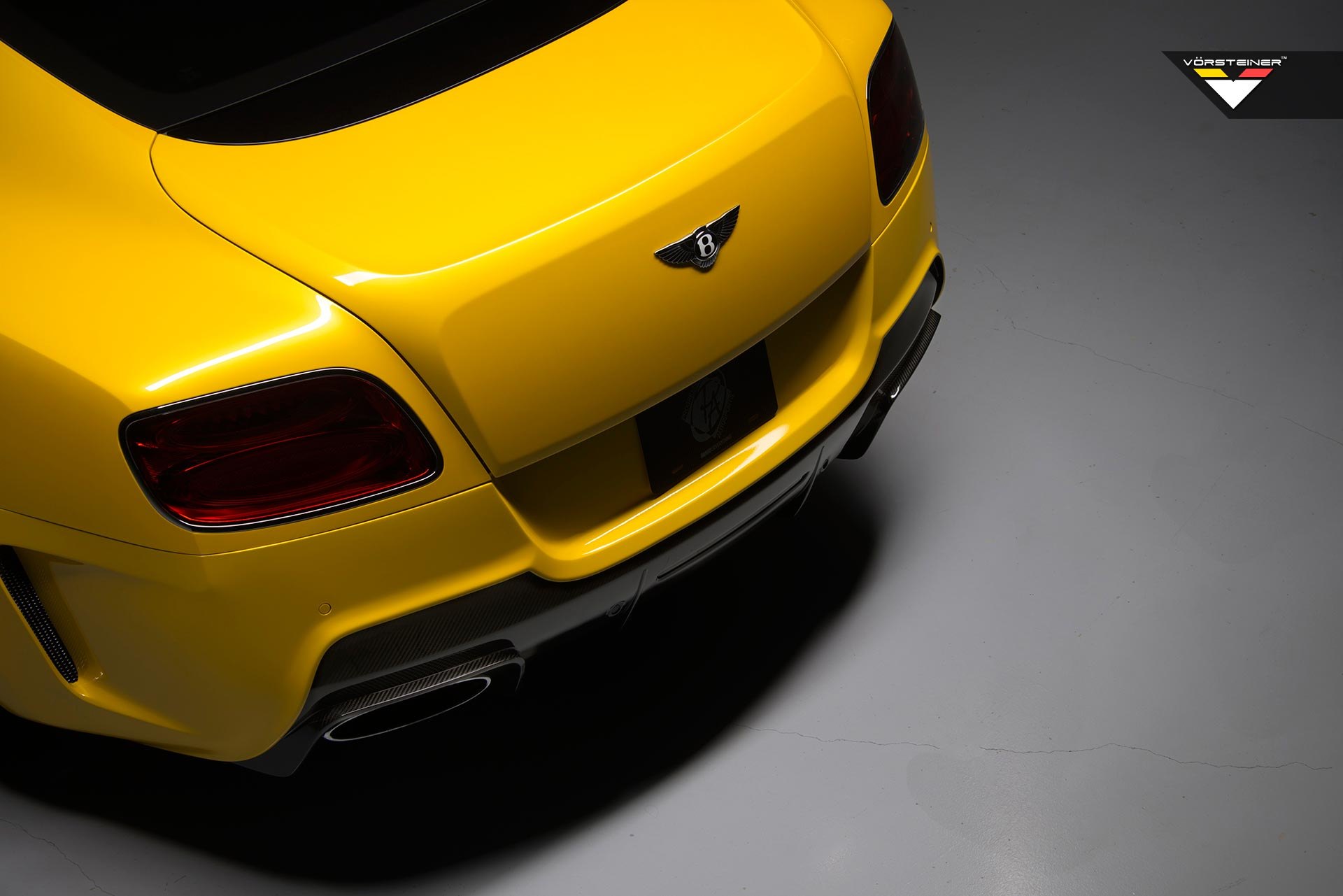 Yellow Bentley Continental with Carbon Fiber Rear Diffuser - Photo by Vorsteiner