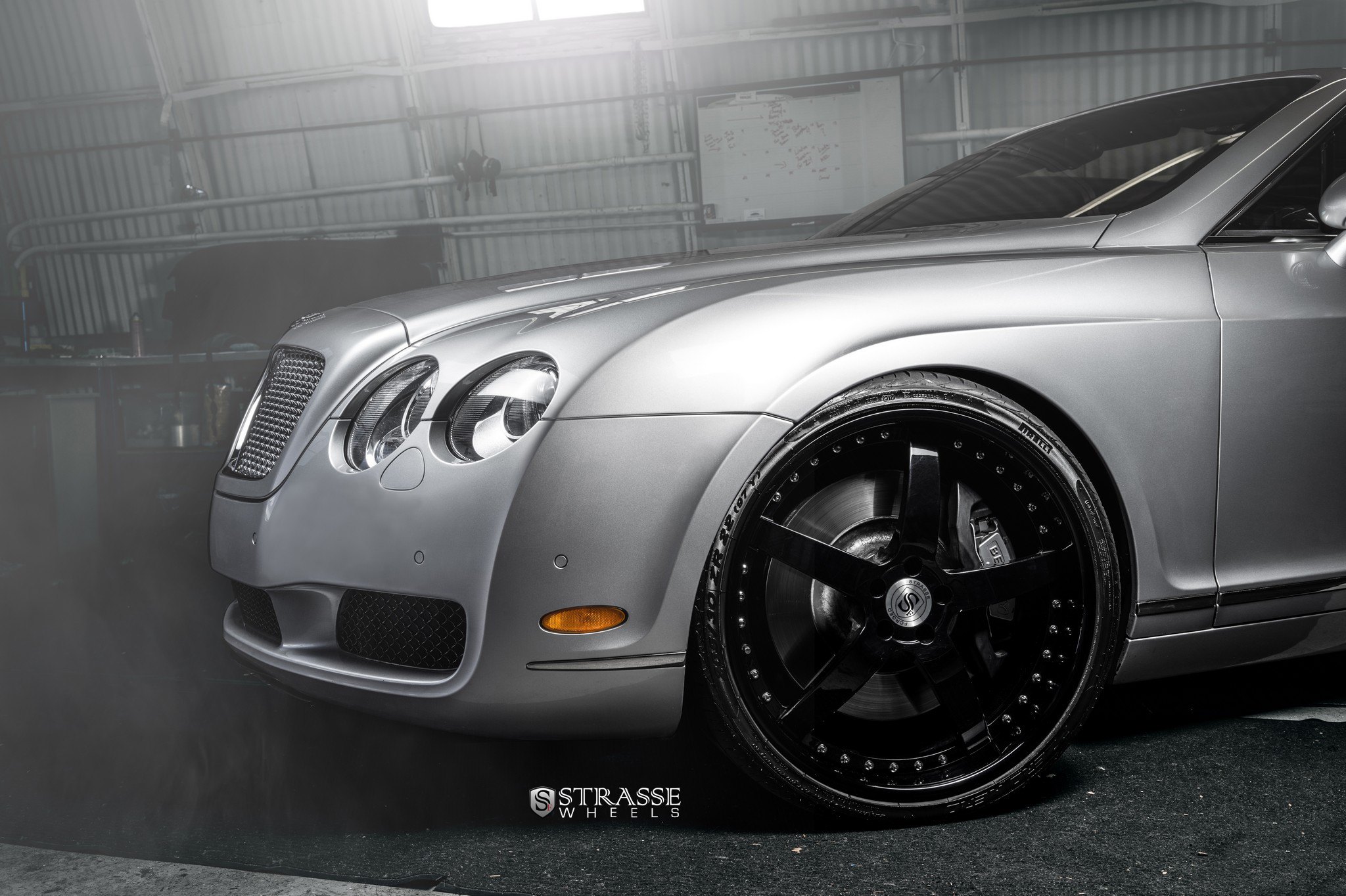 Pirelli Tires on Custom Silver Bentley Continental - Photo by Strasse Forged