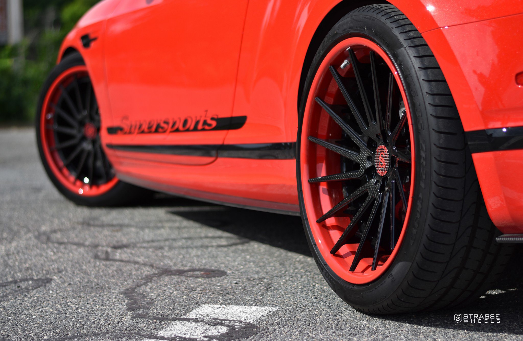 Carbon Fiber Strasse Wheels on Red Bentley Continental - Photo by Strasse Wheels