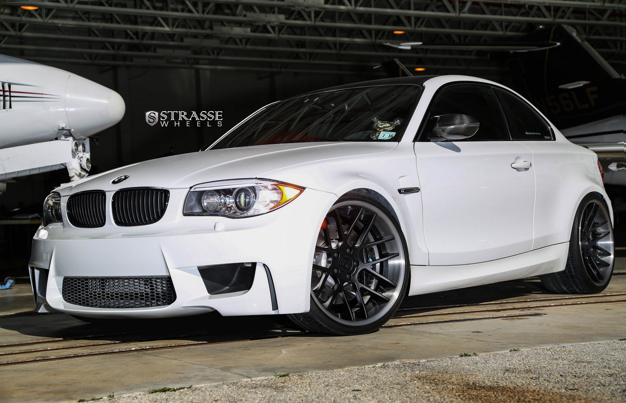 White BMW 1-Series with Custom Projector Headlights - Photo by Strasse Forged