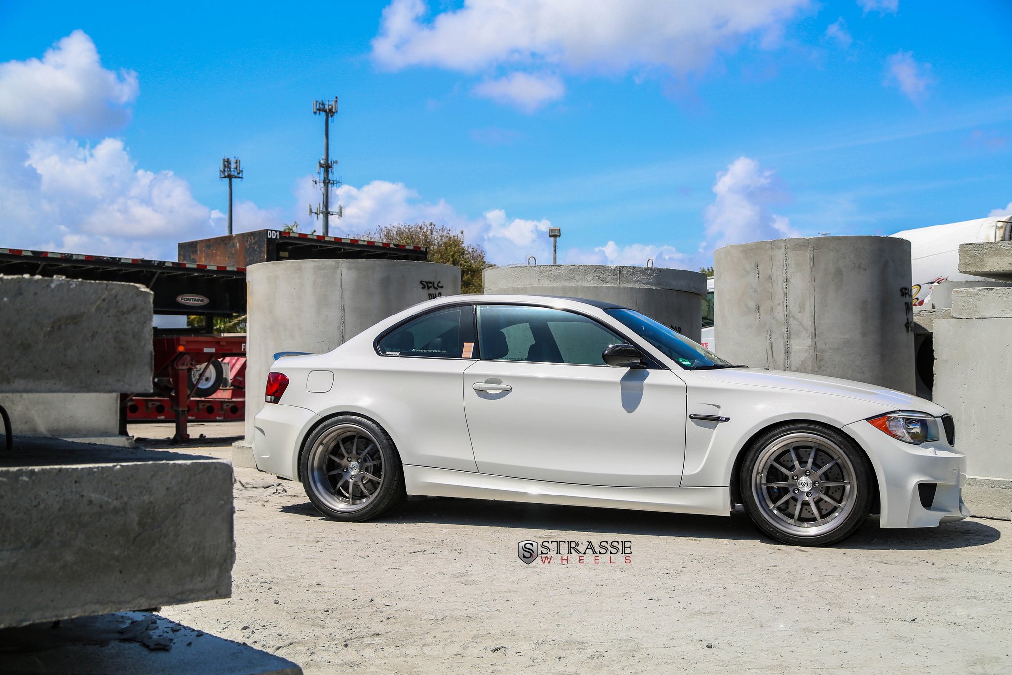 White BMW 1-Series with Custom Side Skirts - Photo by Strasse Forged