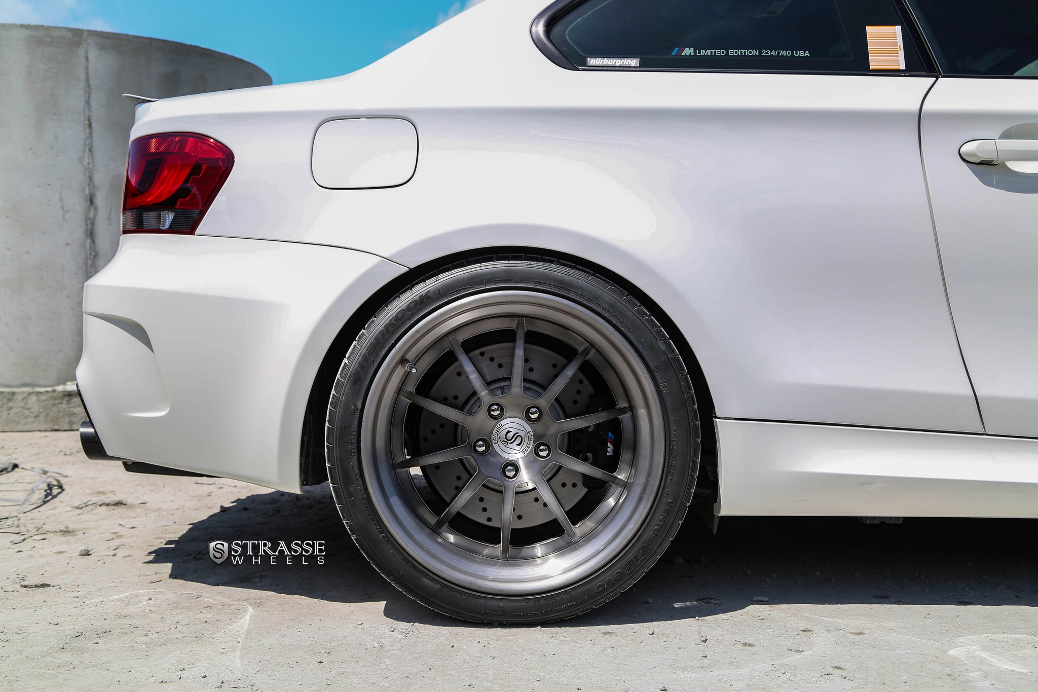 White BMW 1-Series with Custom Gunmetal Strasse Rims - Photo by Strasse Forged