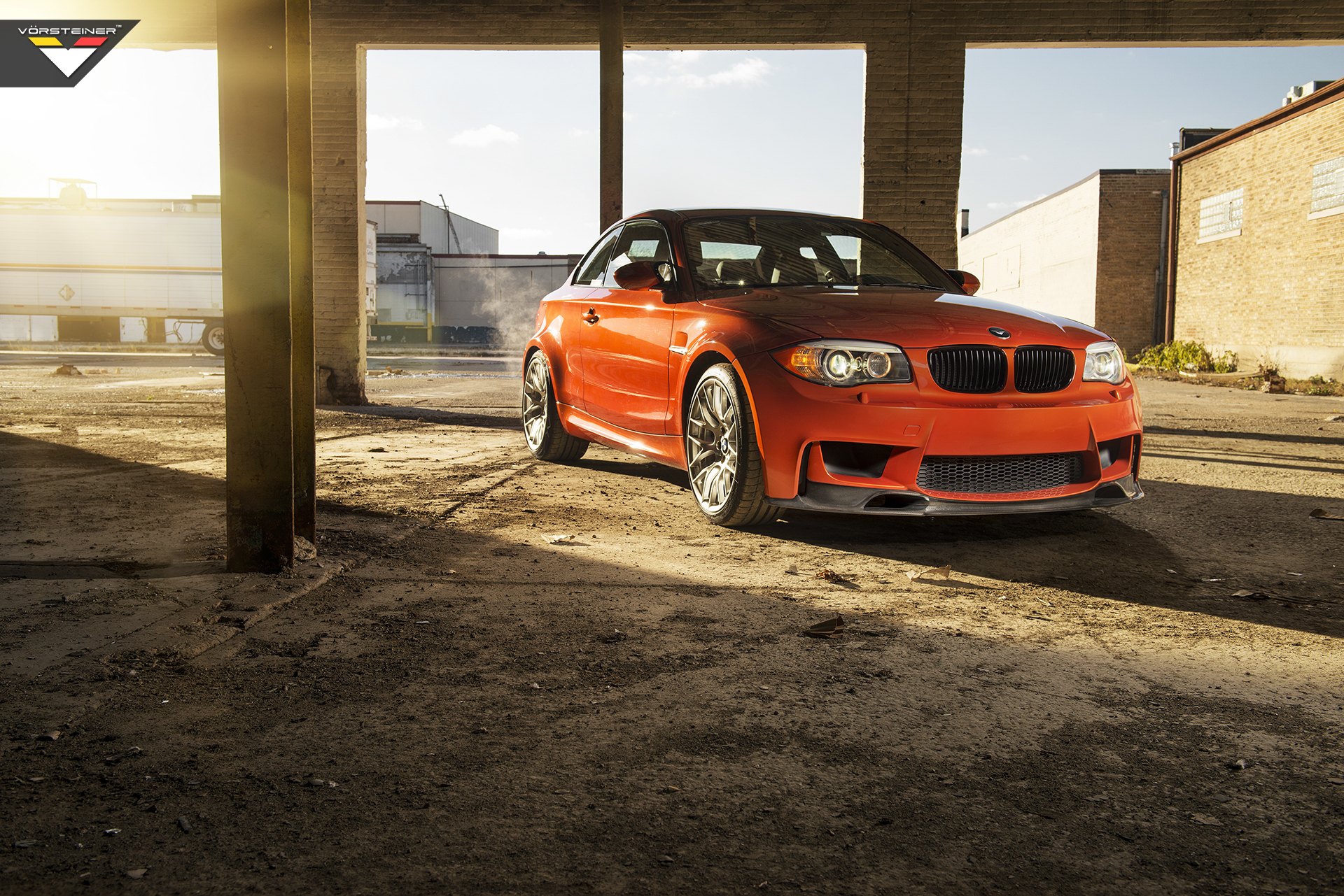 Carbon Fiber Front Lip on Orange BMW 1-Series - Photo by Vorstiner