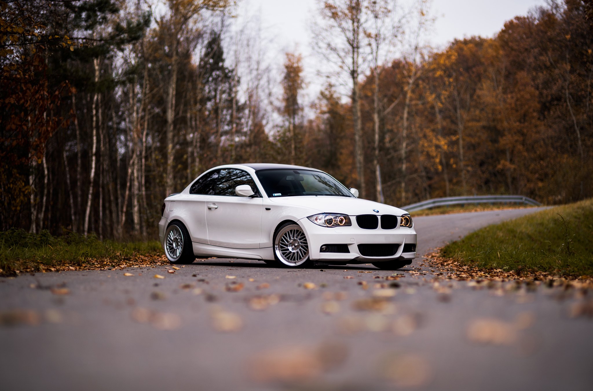 White BMW 1-Series with Custom Halo Headlights - Photo by JR Wheels
