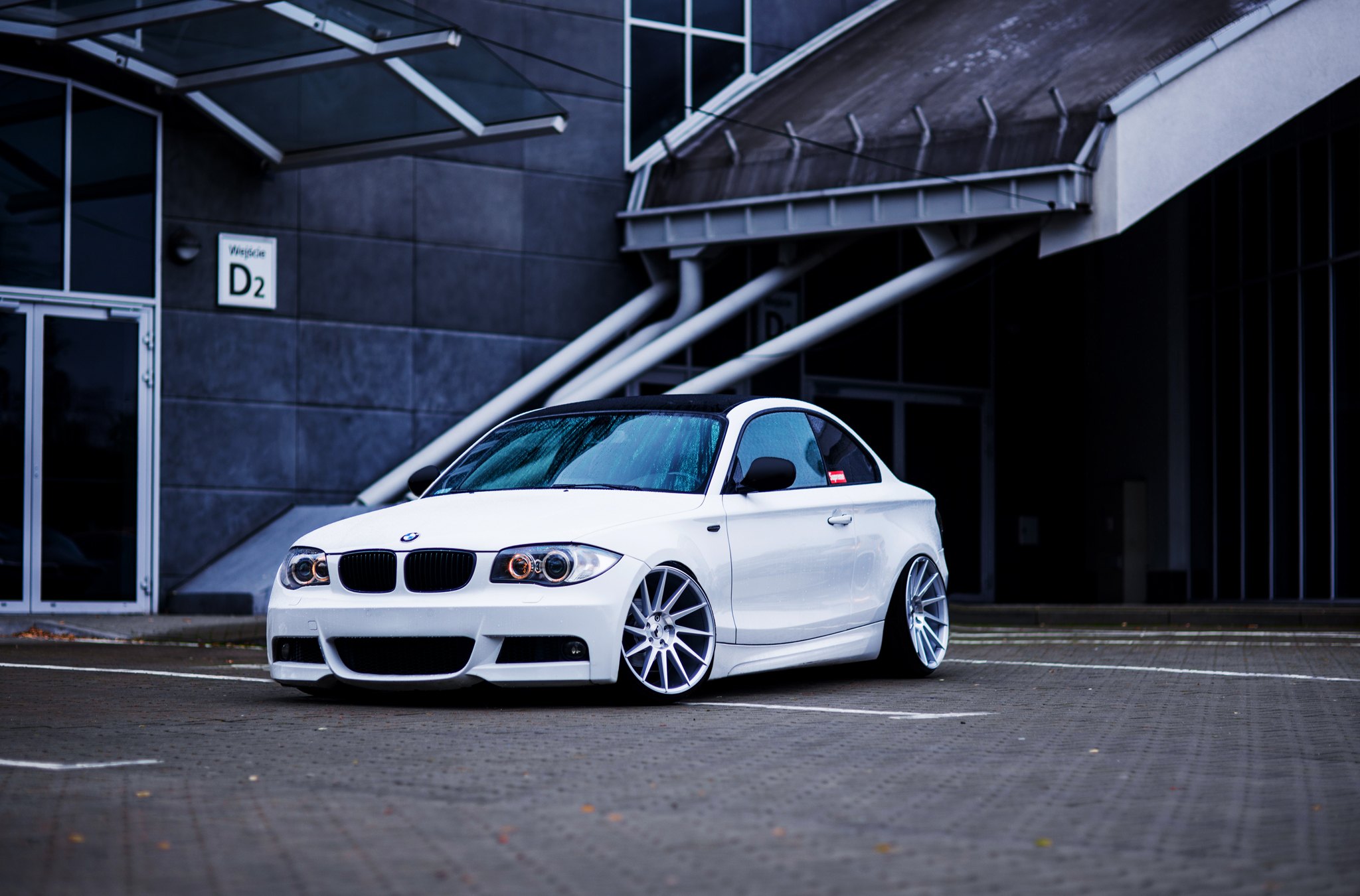 White BMW 1-Series with Aftermarket Front Bumper - Photo by JR Wheels
