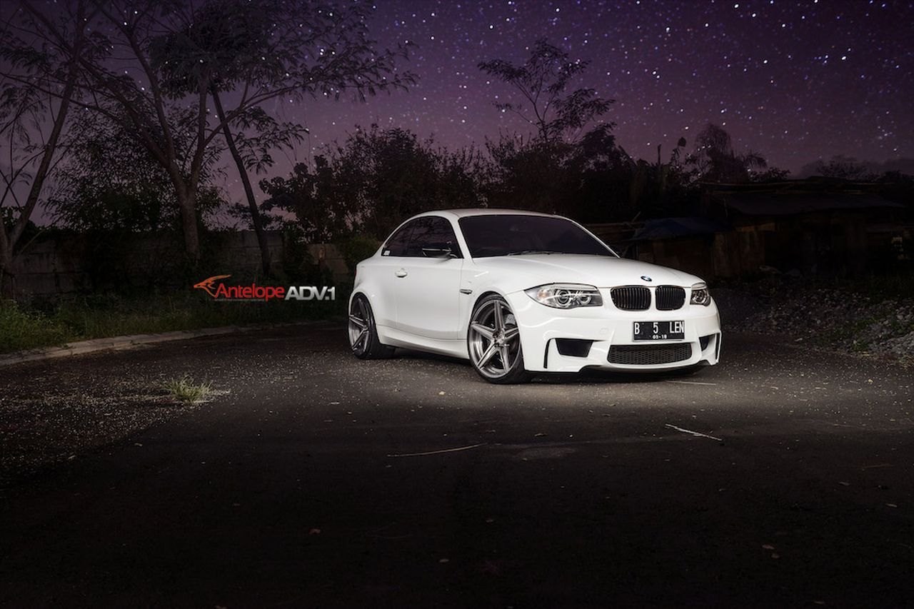 White BMW 1-Series with Aftermarket Front Bumper - Photo by ADV.1