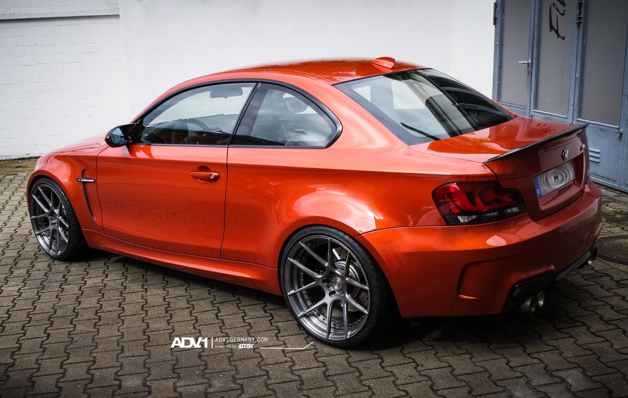 Carbon Fiber Rear Spoiler on Orange BMW 1-Series - Photo by ADV.1