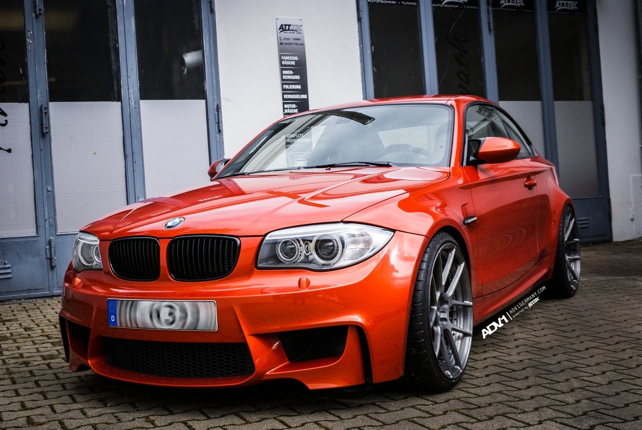Orange BMW 1-Series with Aftermarket Side Skirts - Photo by ADV.1