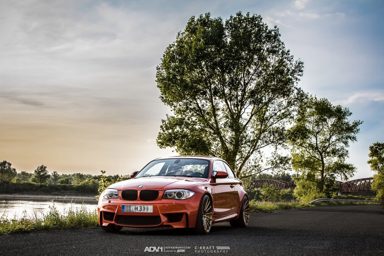 Orange BMW 1-Series with Blacked Out Grille - Photo by ADV.1