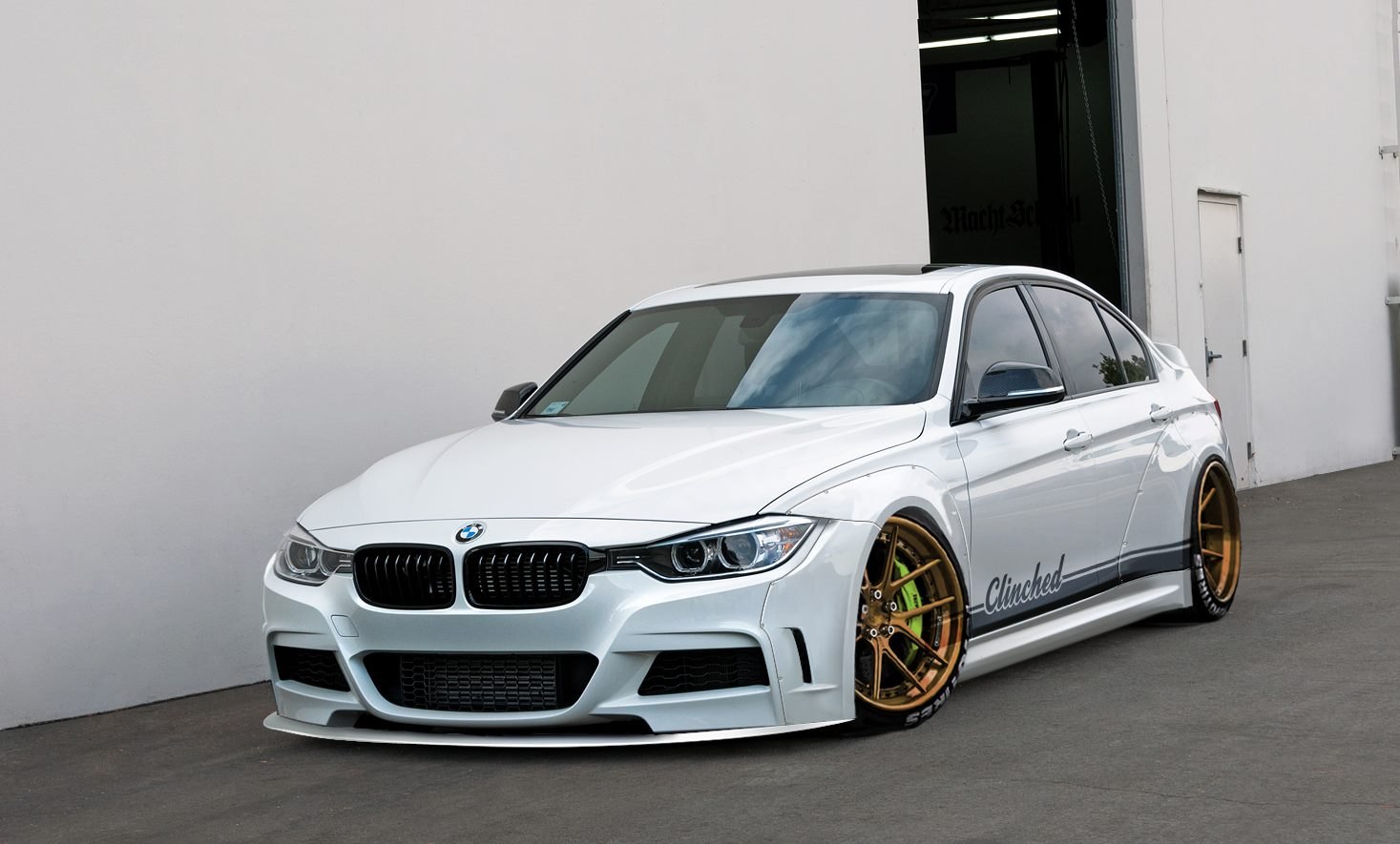 White Stanced BMW 3-Series with Aftermarket Front Bumper - Photo by Clinched
