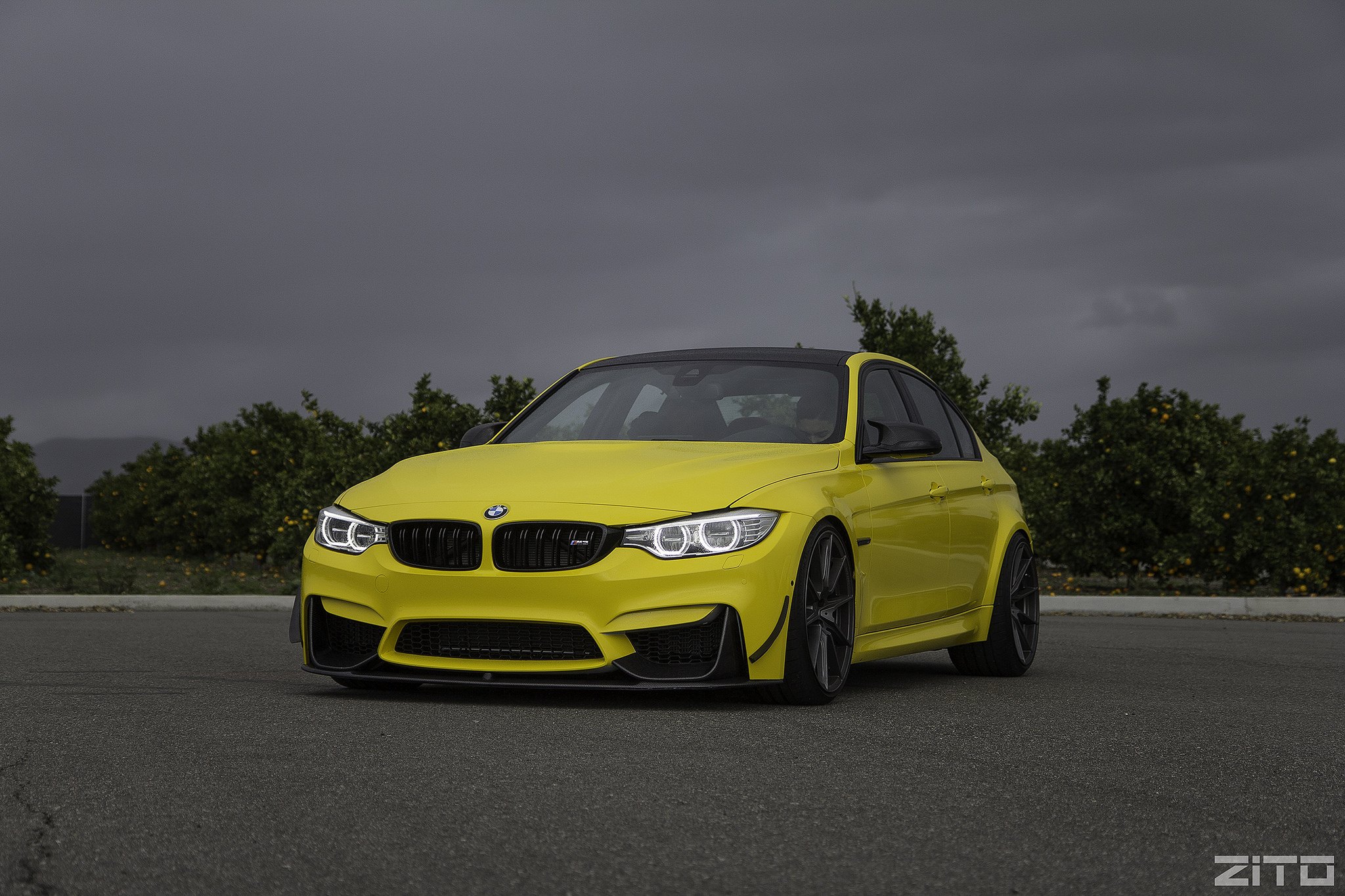 Yellow BMW 3-Series with Carbon Fiber Front Lip - Photo by Zito Wheels