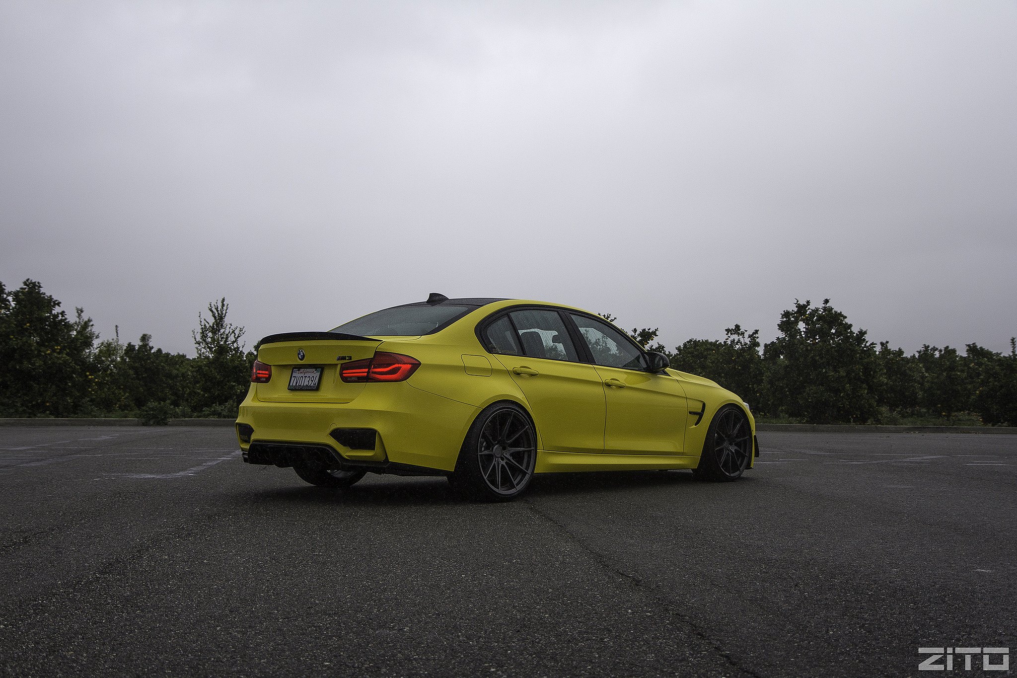 Rear Lip Spoiler on Yellow BMW 3-Series - Photo by Zito Wheels