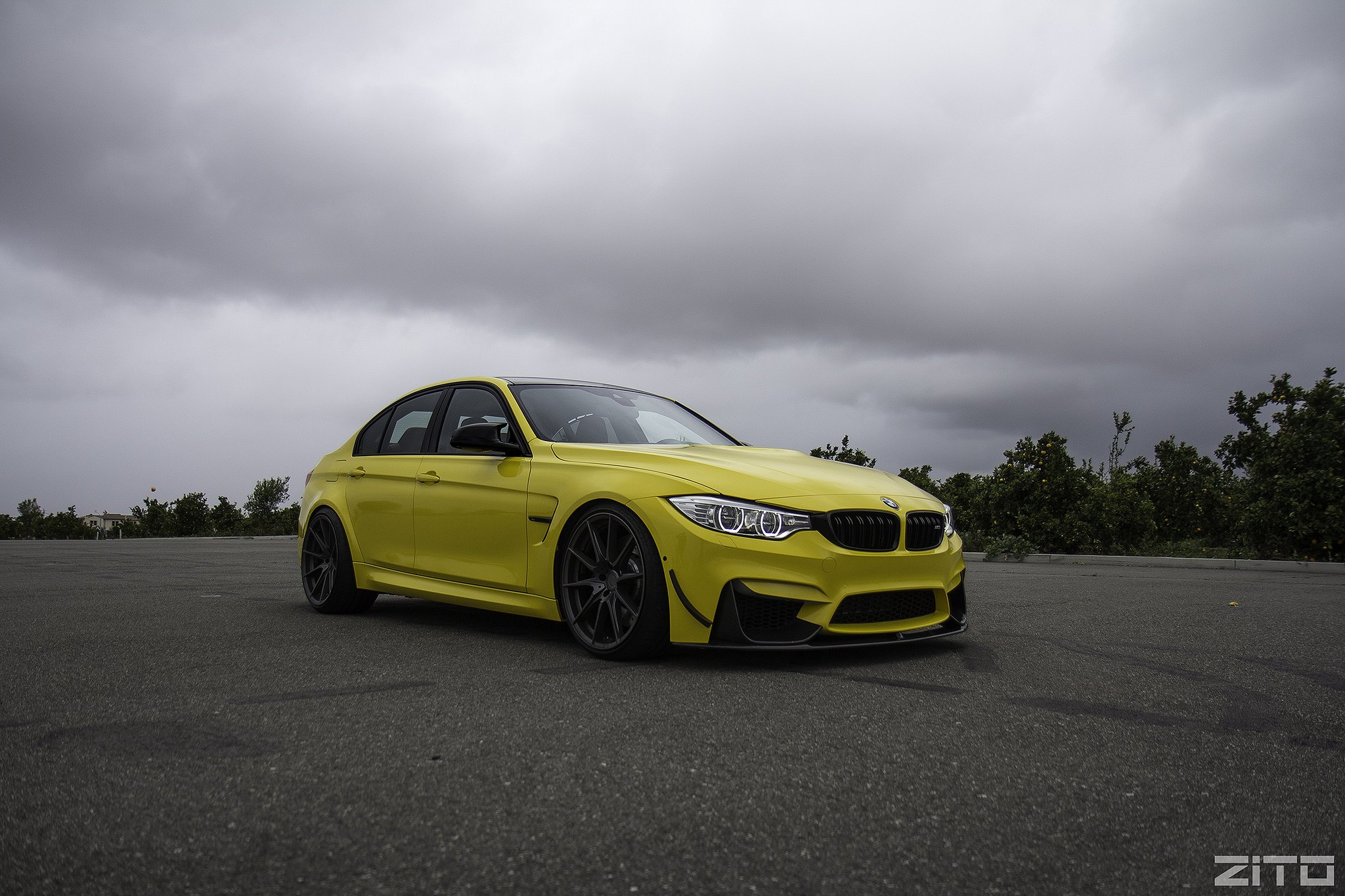 Aftermarket Halo Headlights on Yellow BMW 3-Series - Photo by Zito Wheels