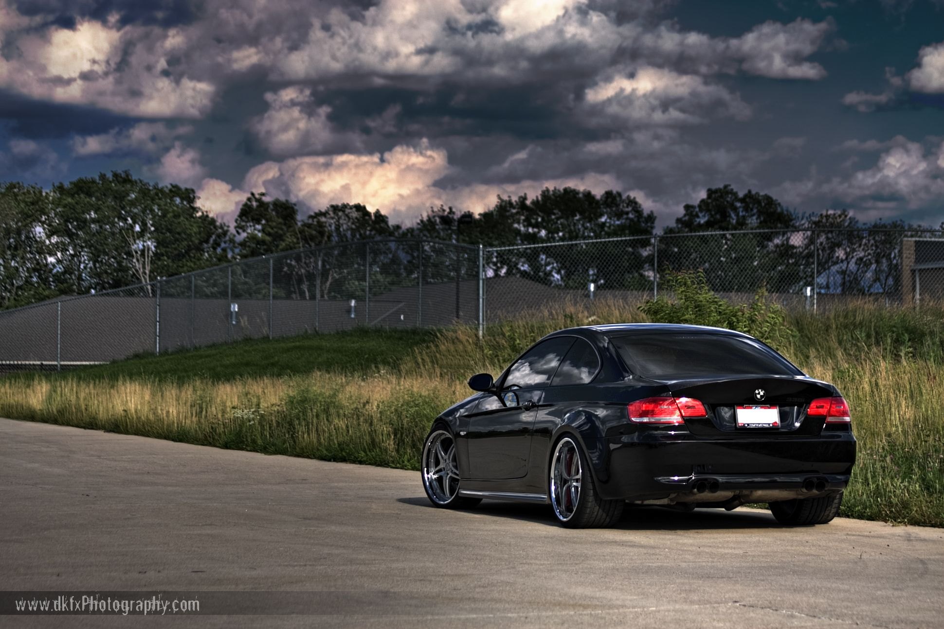 Black BMW 3-Series with Aftermarket Rear Diffuser - Photo by dan kinzie