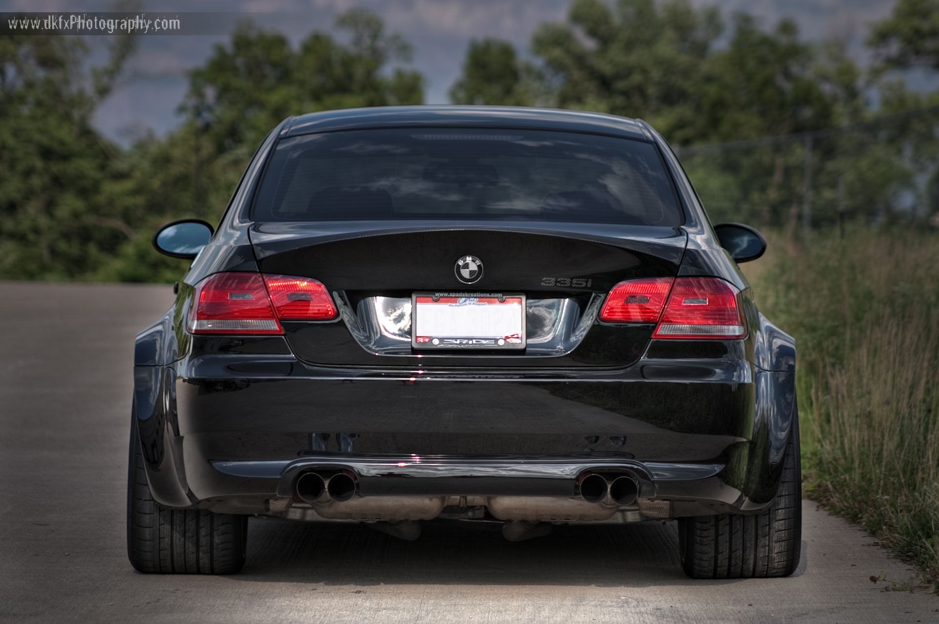 Red LED Taillights on Black BMW 3-Series - Photo by dan kinzie