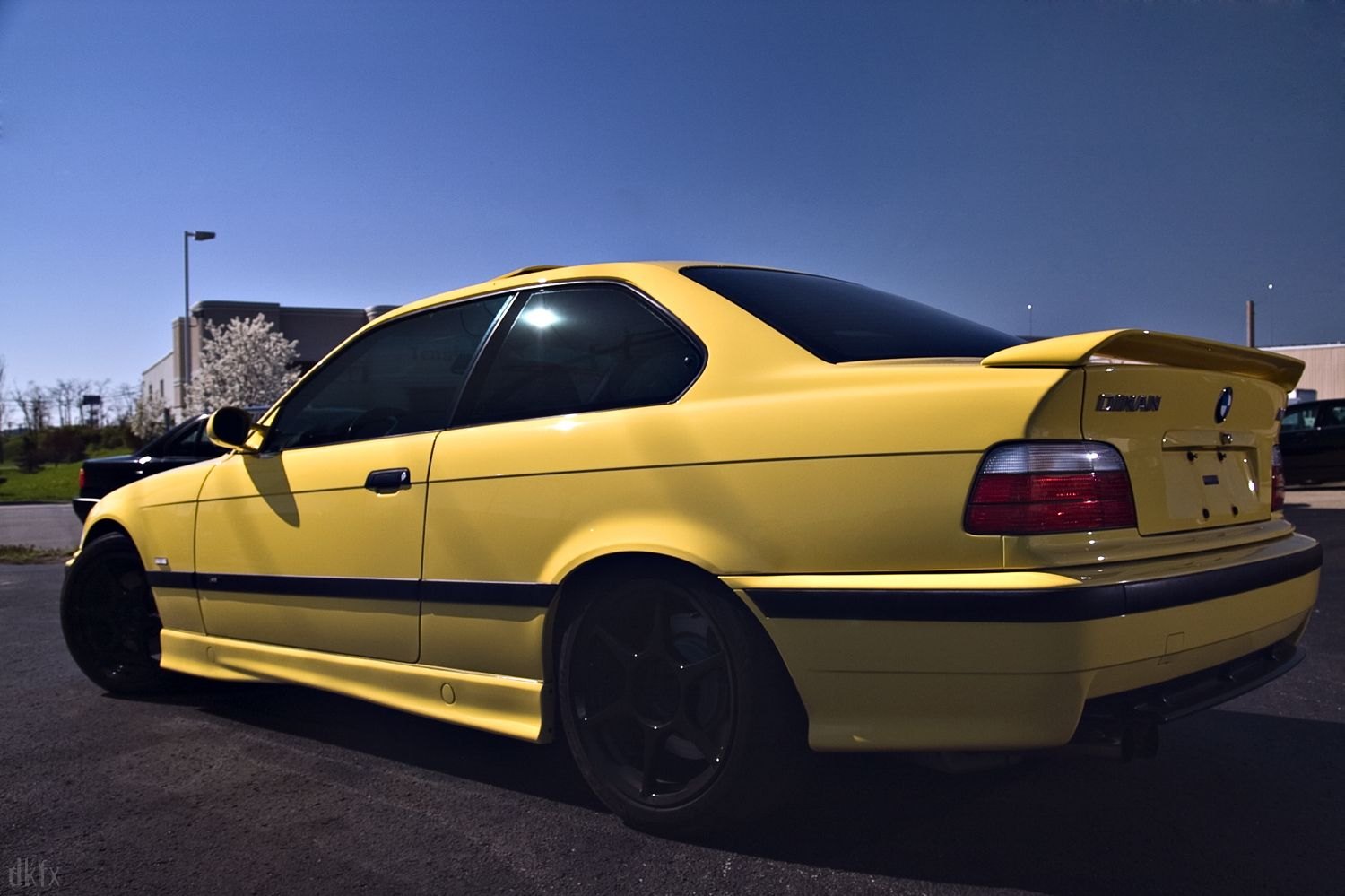 Yellow BMW 3-Series with Custom Style Rear Spoiler - Photo by dan kinzie