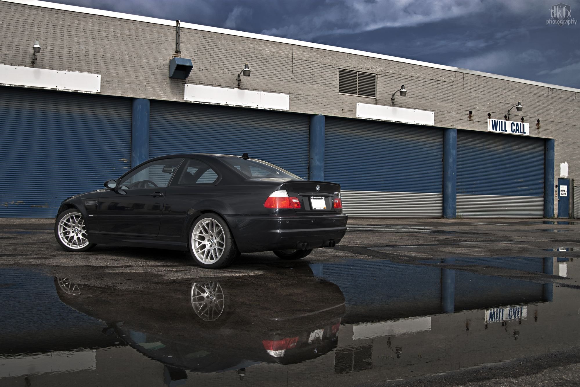 Black BMW 3-Series with Custom Chrome Wheels - Photo by dan kinzie