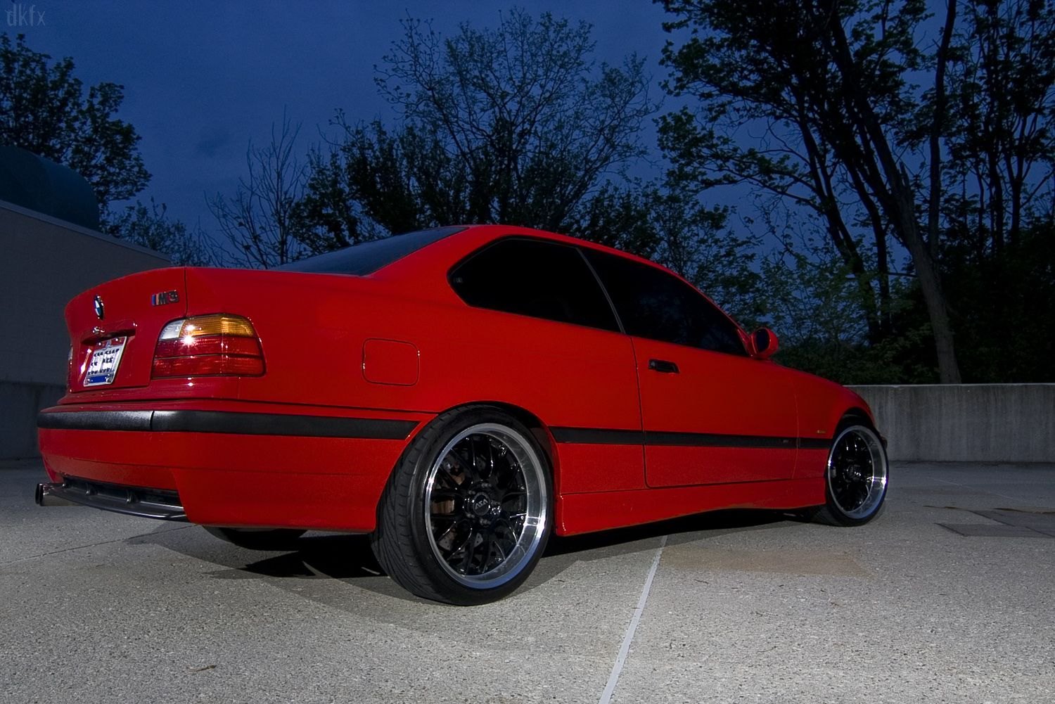 Red BMW 3-Series with Aftermarket Rear Diffuser - Photo by dan kinzie