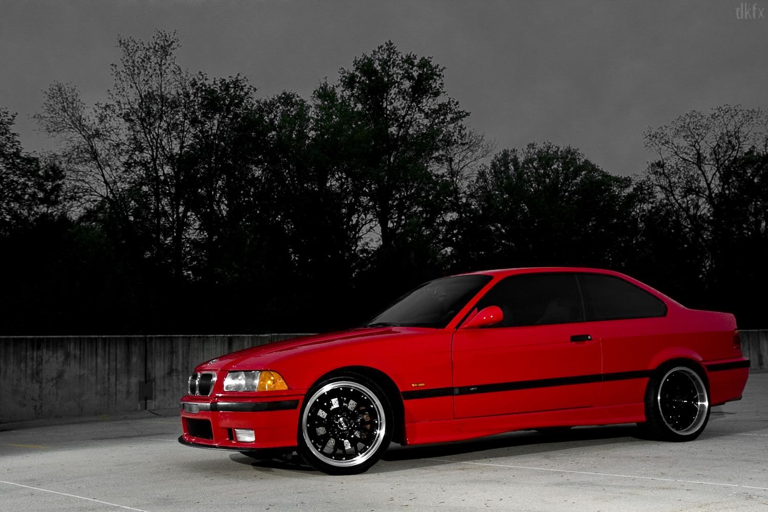 Red BMW 3-Series with Custom Gloss Black Rims - Photo by dan kinzie