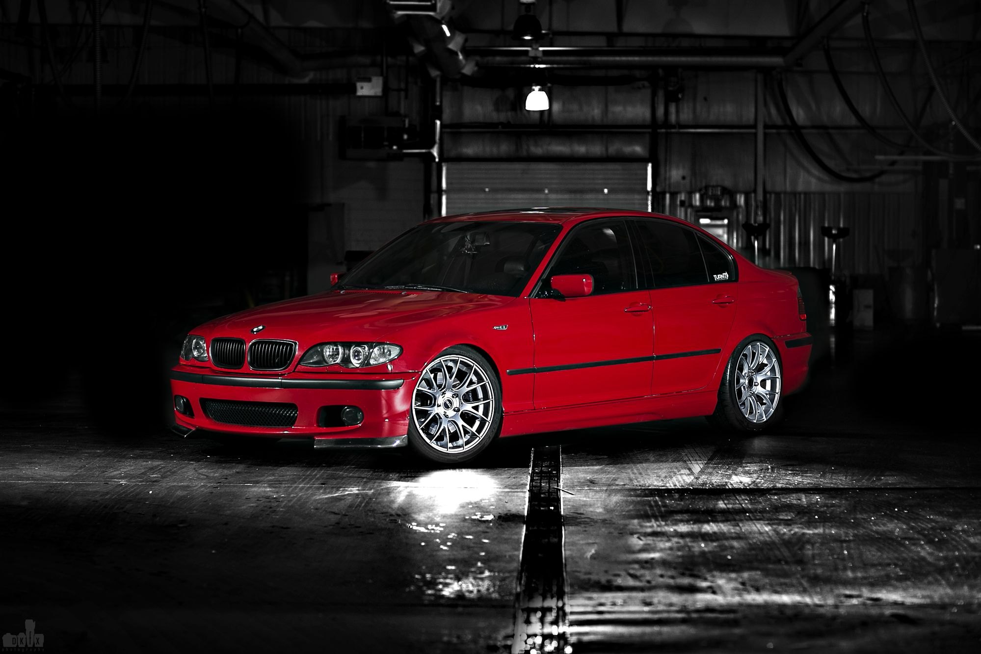 Red BMW 3-Series with Dark Smoke Halo Headlights - Photo by dan kinzie