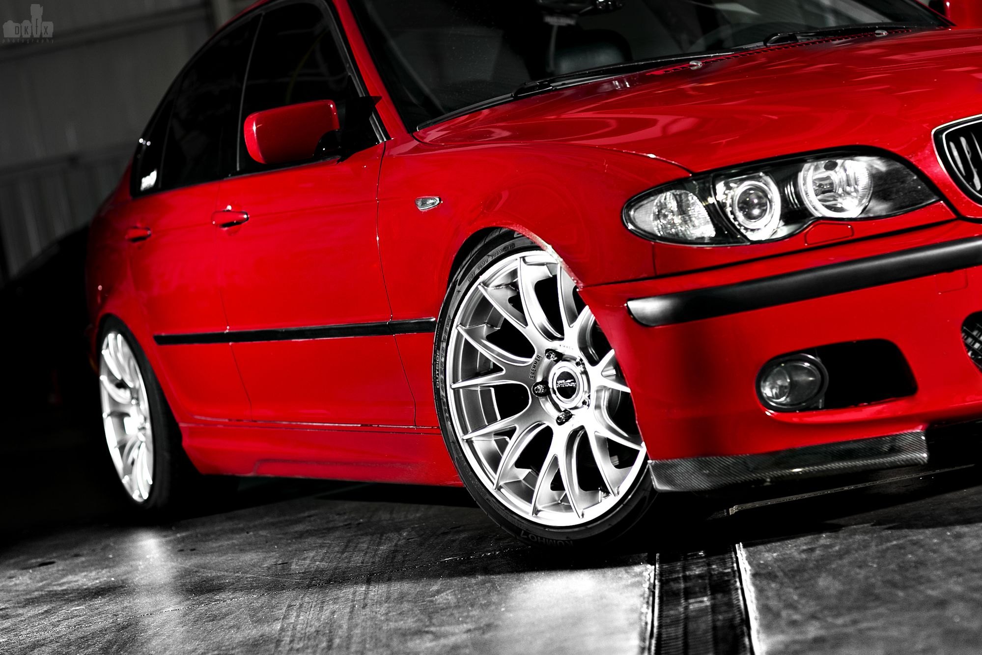 Carbon Fiber Canards on Red BMW 3-Series - Photo by dan kinzie