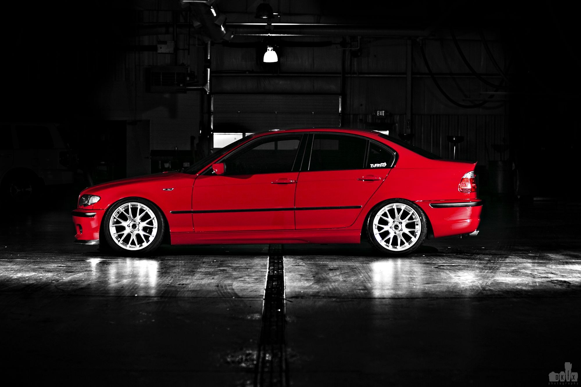 Red BMW 3-Series with Aftermarket Side Skirts - Photo by dan kinzie