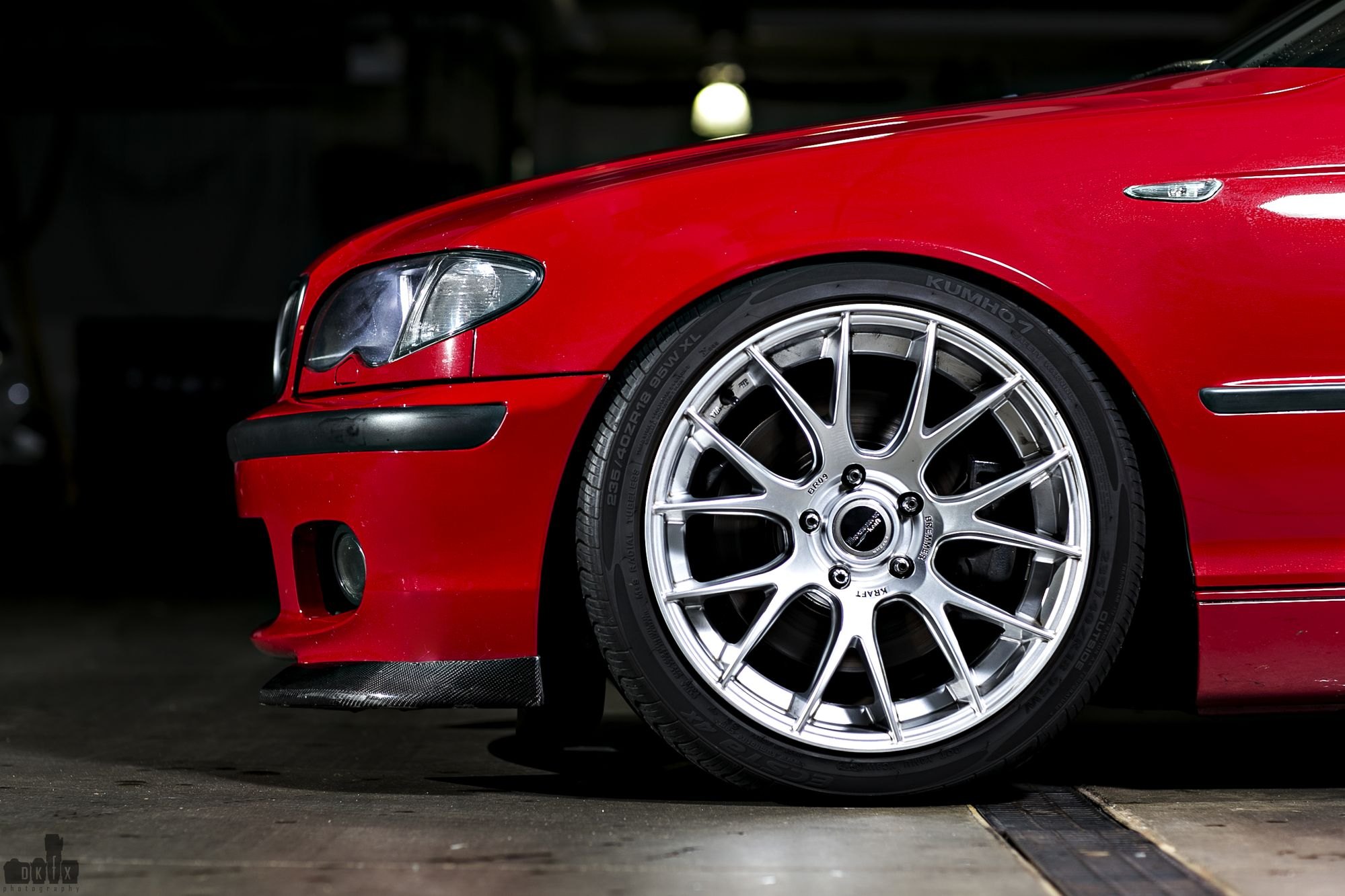 Red BMW 3-Series with Chrome Bremmer Kraft Rims - Photo by dan kinzie