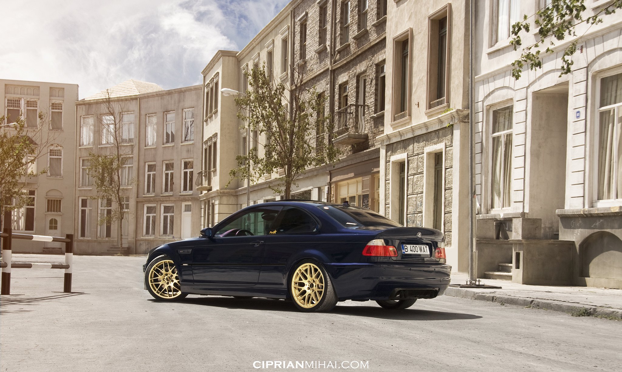 Blue BMW 3-Series with Custom Bronze Wheels - Photo by Ciprian Mihai