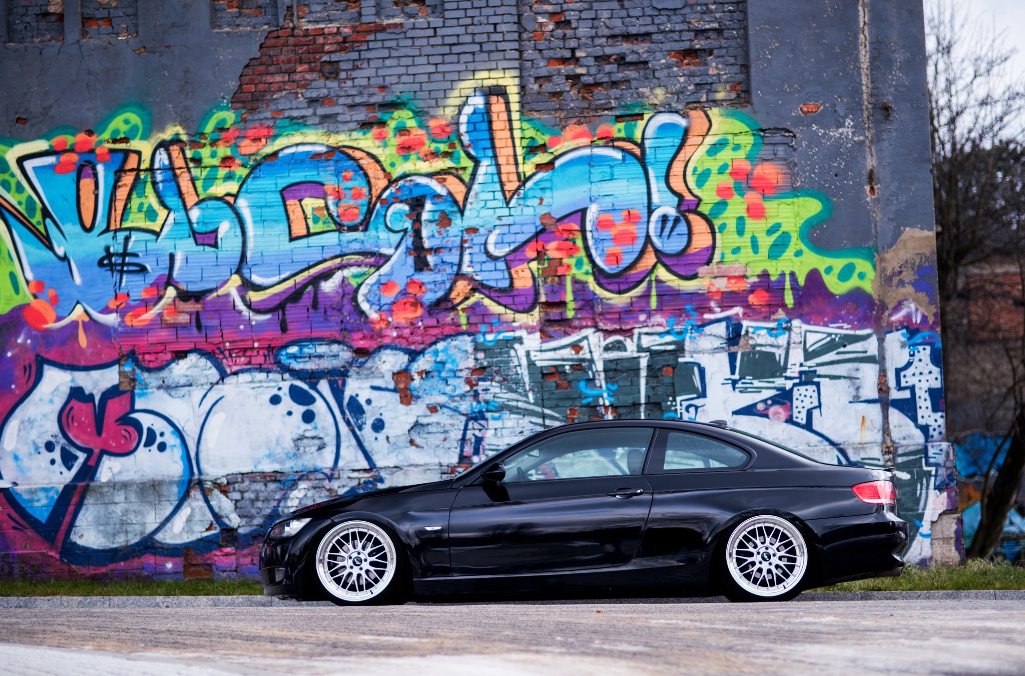 Aftermarket Side Skirts on Black BMW 3-Series - Photo by JR Wheels