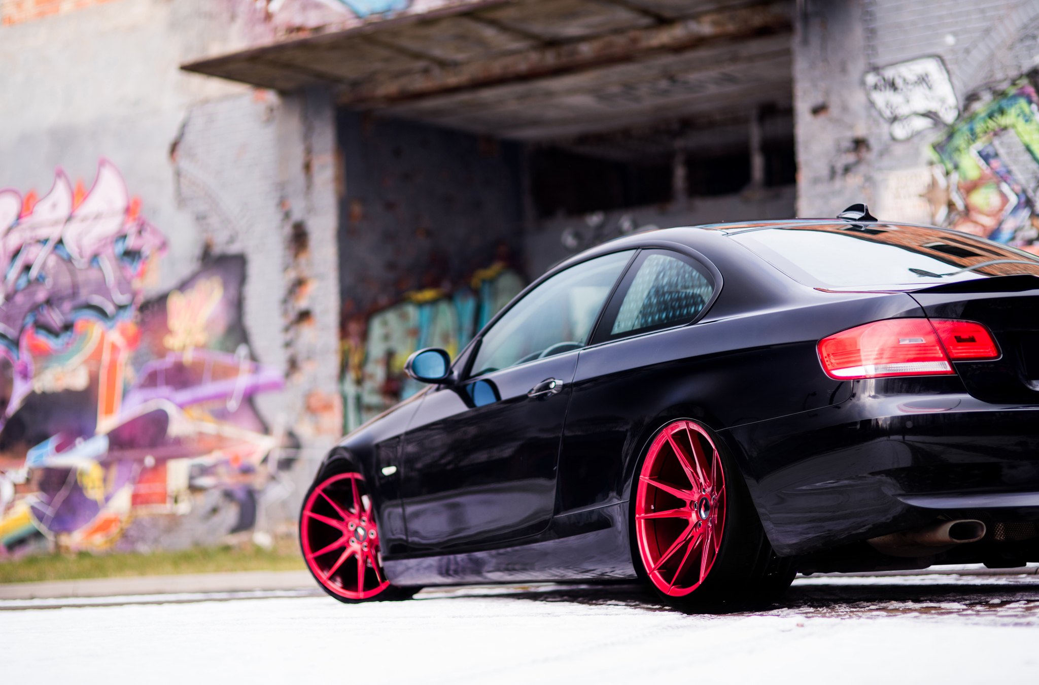 Red JR Wheels on Black BMW 3-Series - Photo by JR Wheels