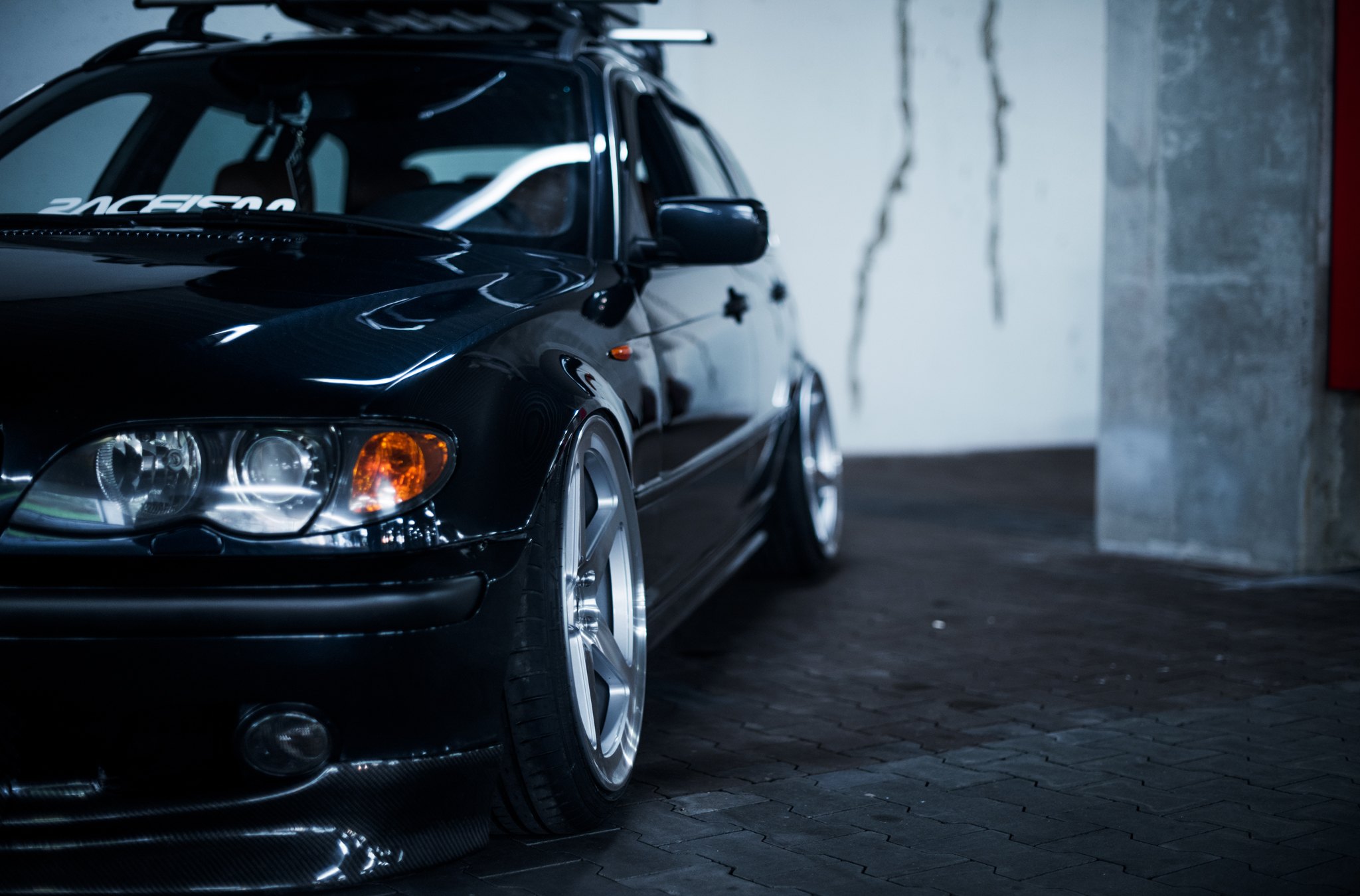 Aftermarket Projector Headlights on Black BMW 3-Series - Photo by JR Wheels