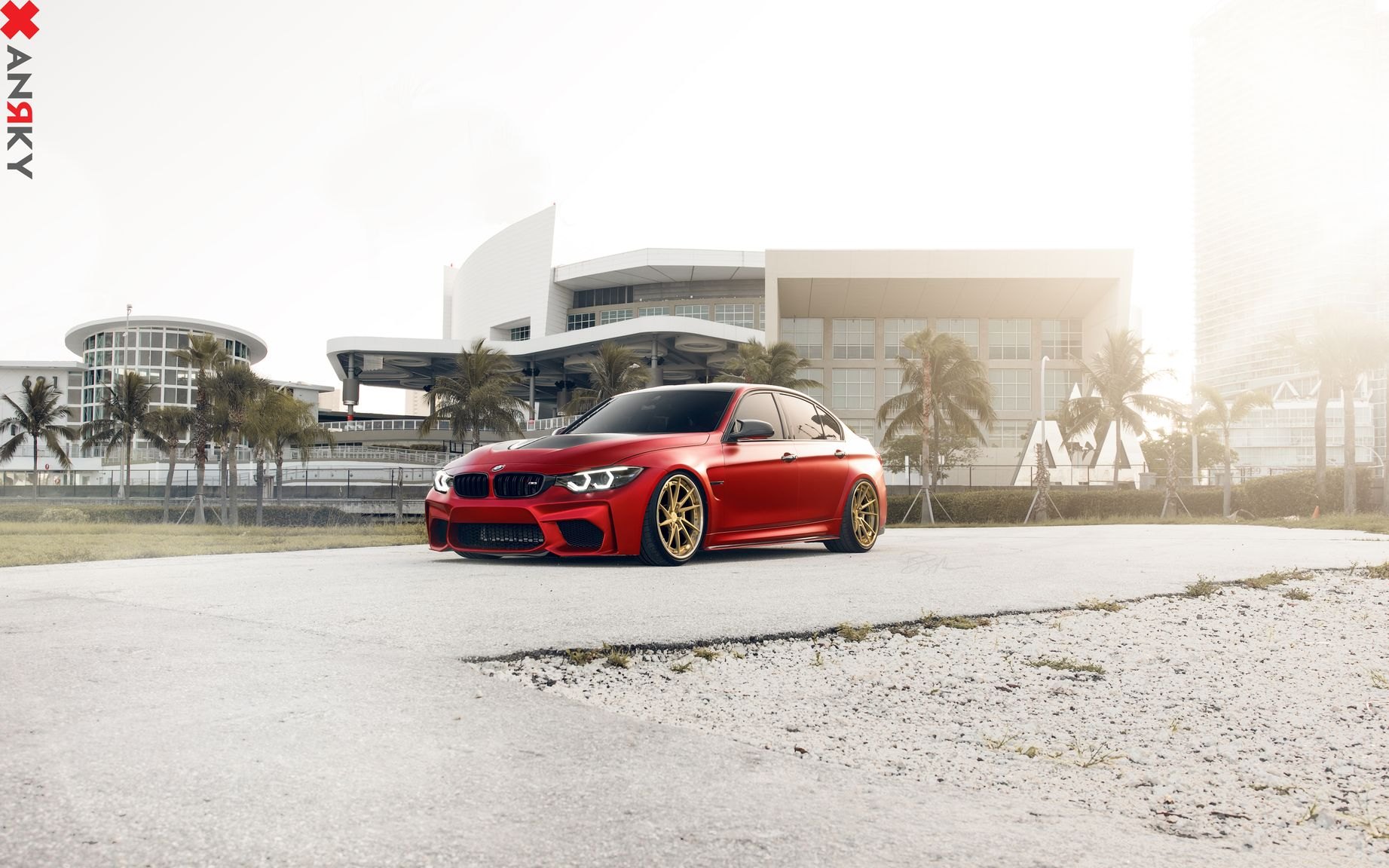 Red BMW 3-Series with Aftermarket Front Bumper - Photo by Anrky Wheels