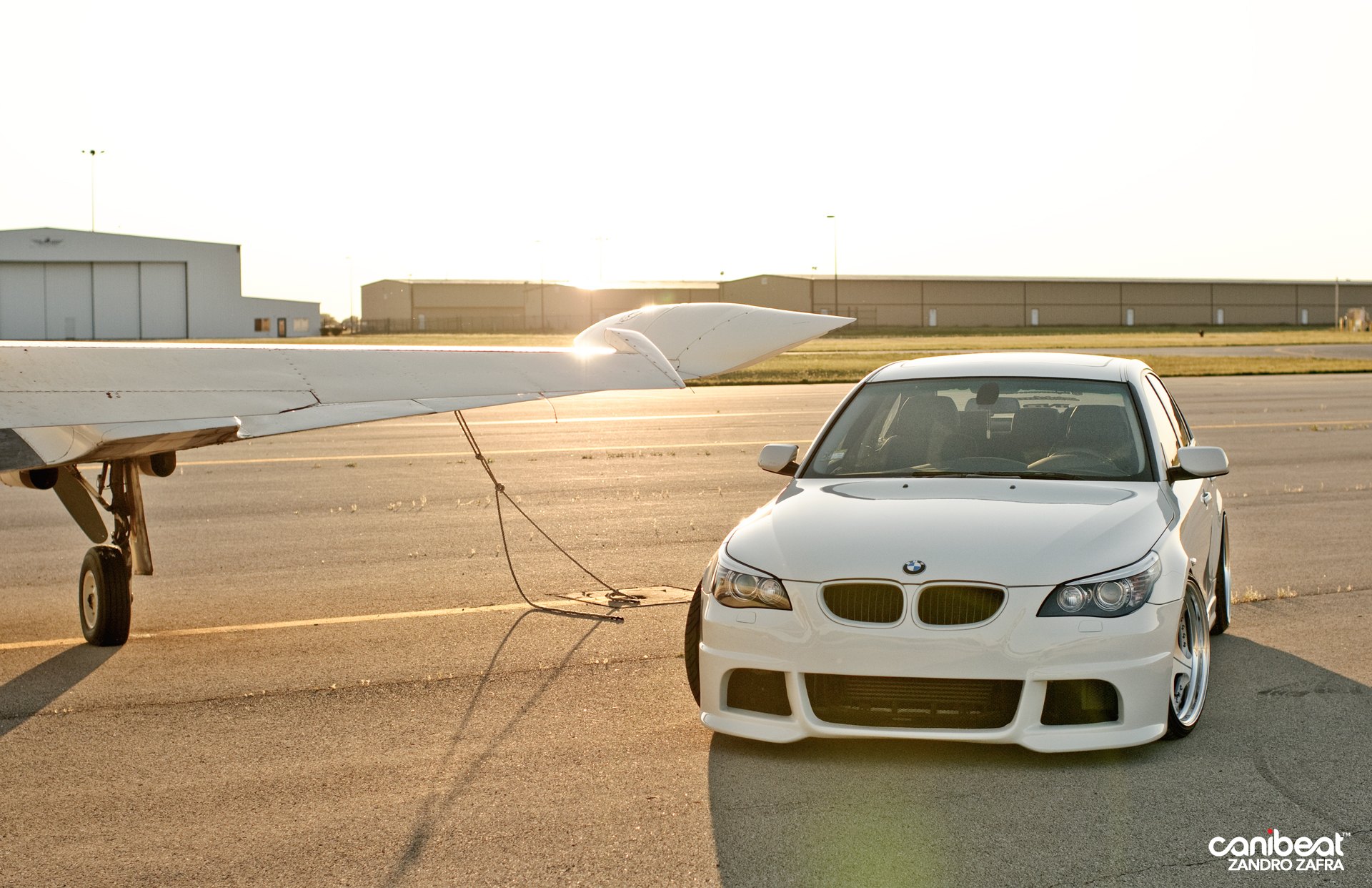 White BMW 5-Series with Aftermarket Halo Headlights  - Photo by zandbox