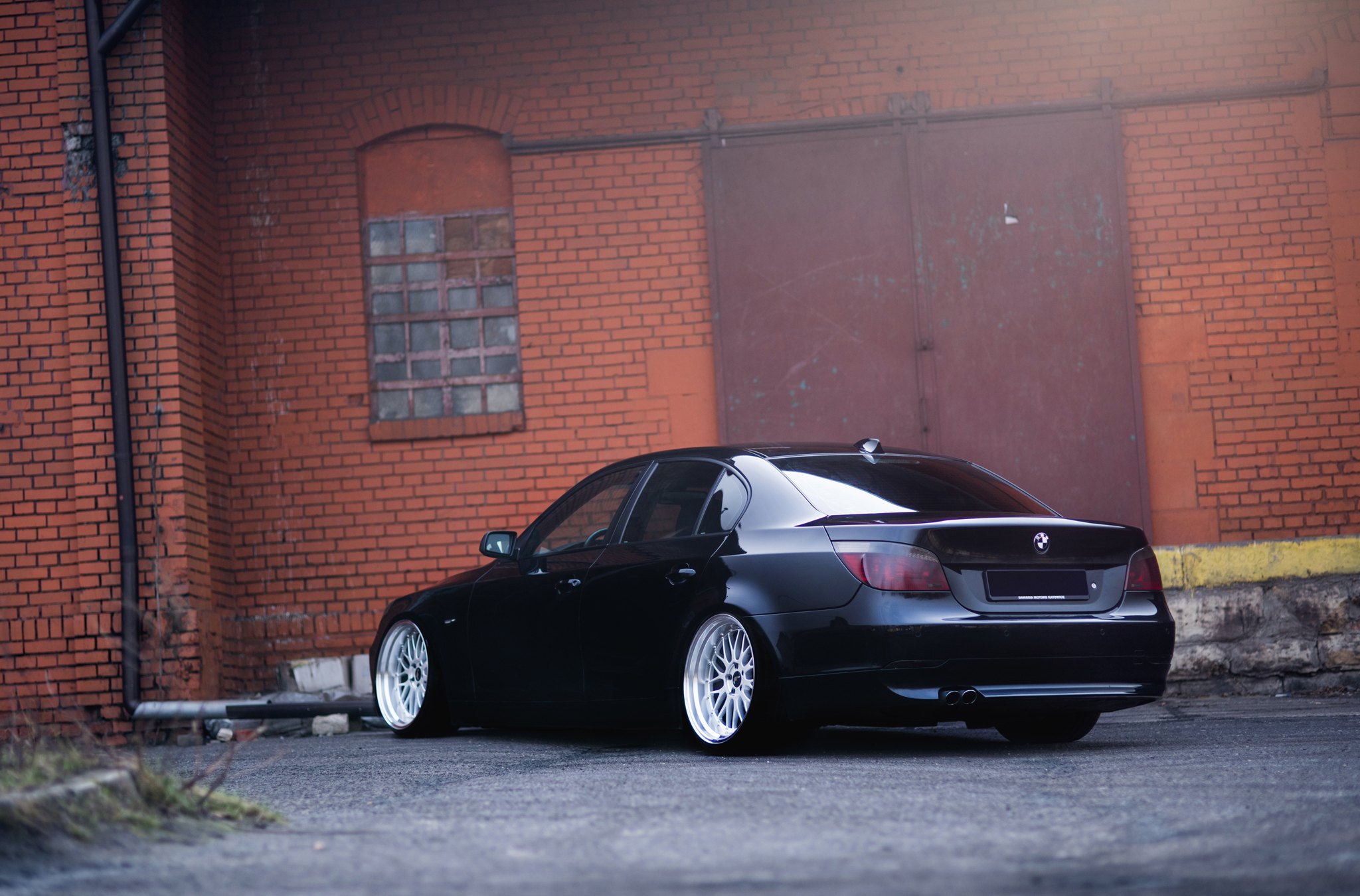 Black BMW 5-Series with Aftermarket Rear Diffuser - Photo by JR Wheels