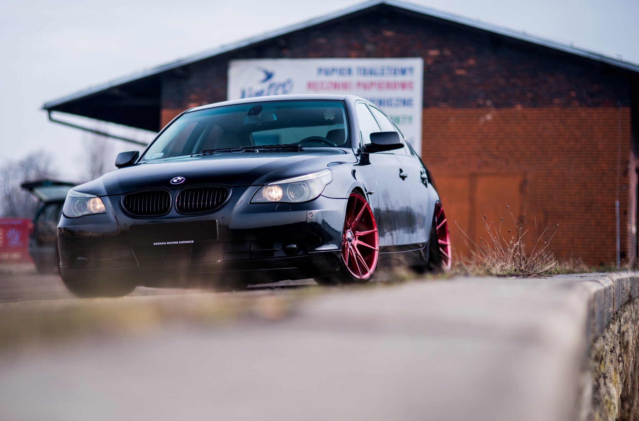 Aftermarket Front Bumper on Black BMW 5-Series - Photo by JR Wheels