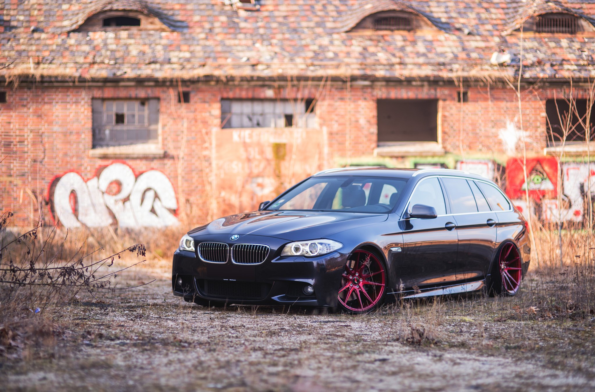 Front Bumper with Fog Lights on Black BMW 5-Series - Photo by JR Wheels