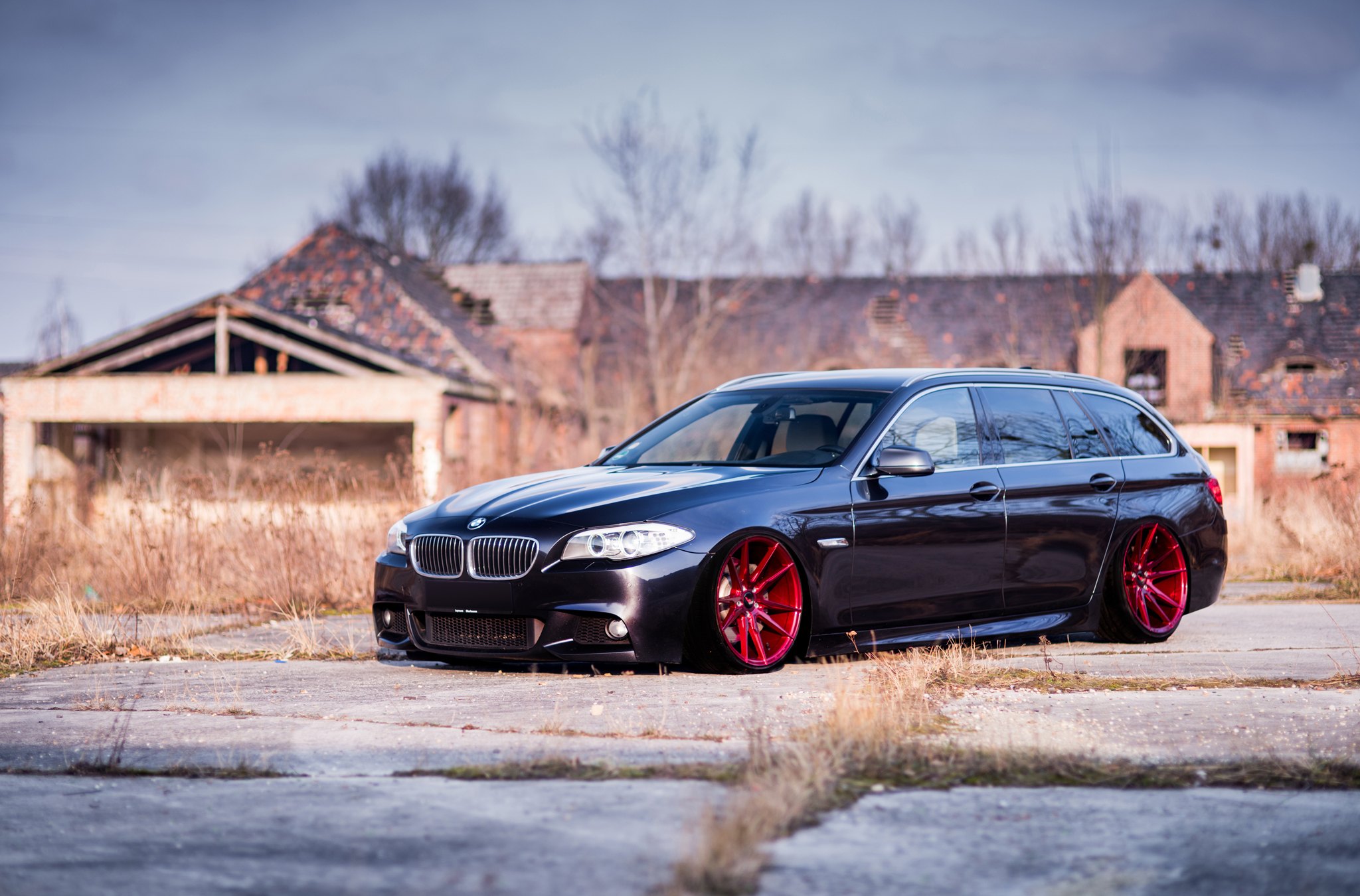 Black BMW 5-Series with Aftermarket Halo Headlights - Photo by JR Wheels