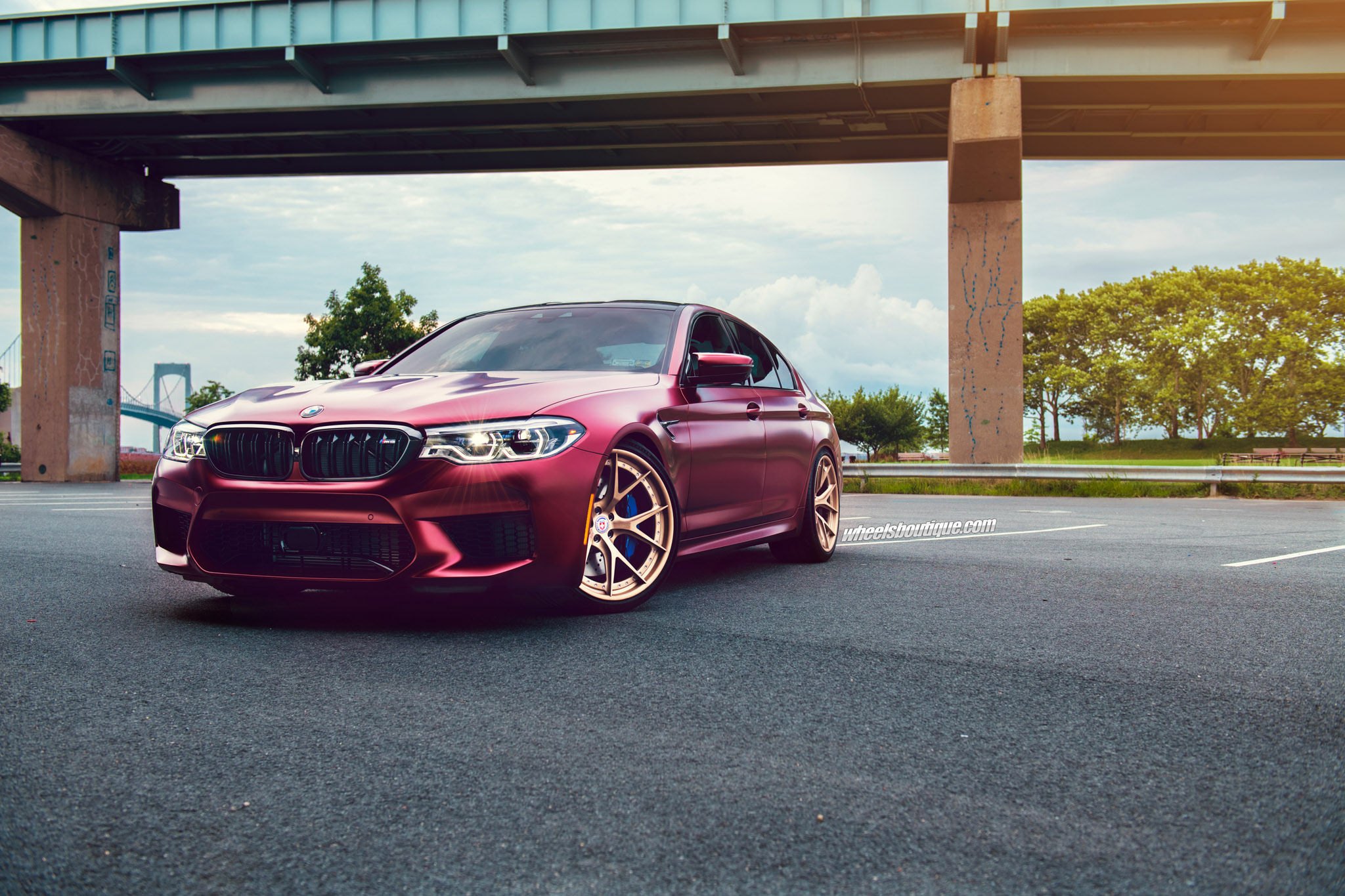 Red BMW 5-Series with Custom Halo Headlights - Photo by HRE Wheels