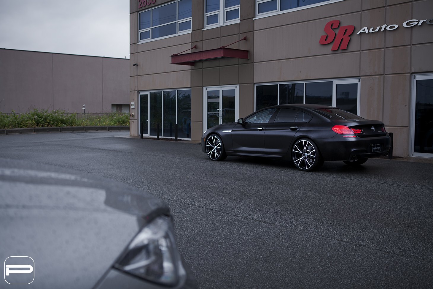 Aftermarket Side Skirts on Black BMW 6-Series - Photo by PUR Wheels
