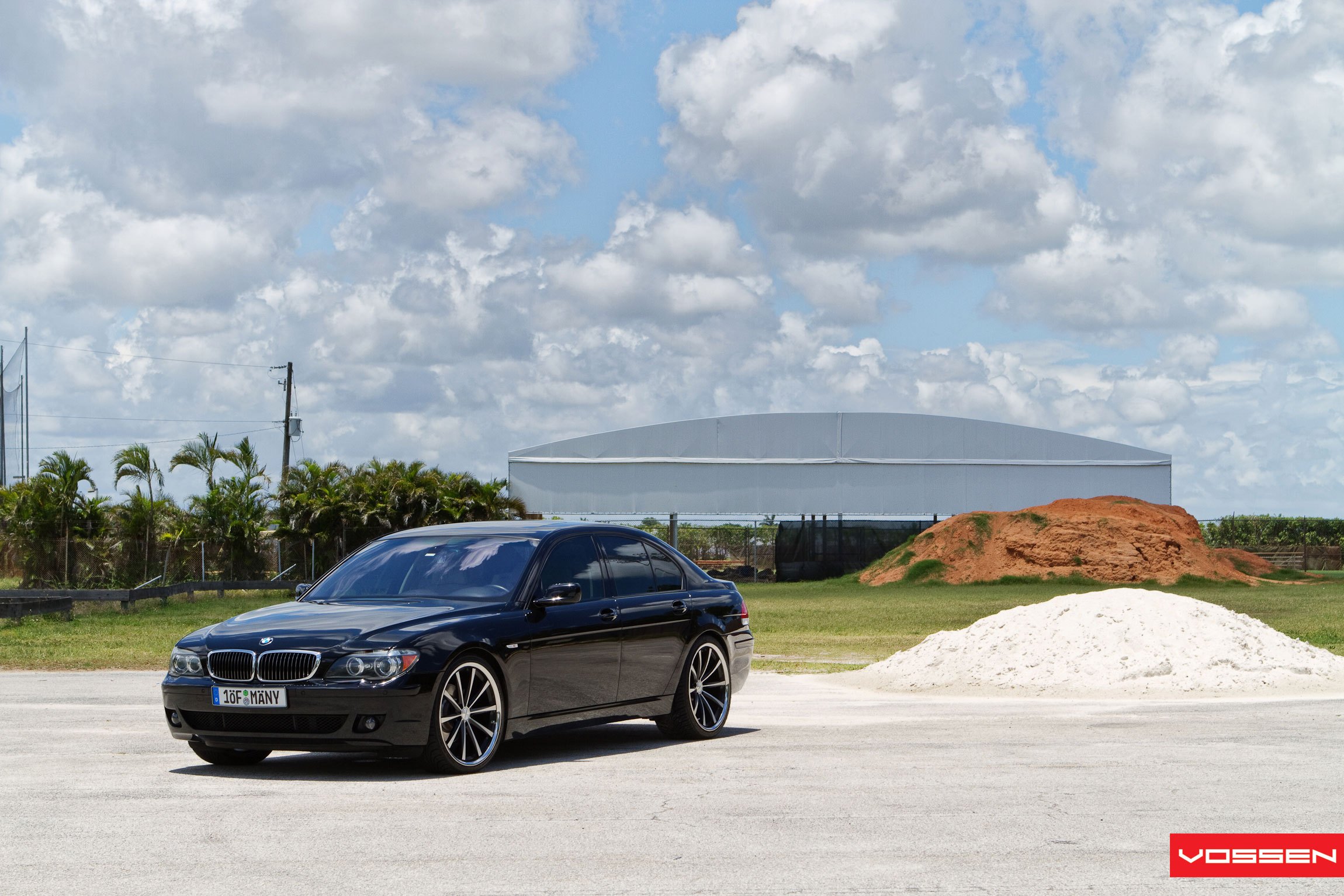 Black BMW 7-Series with Custom Front Bumper Cover - Photo by Vossen
