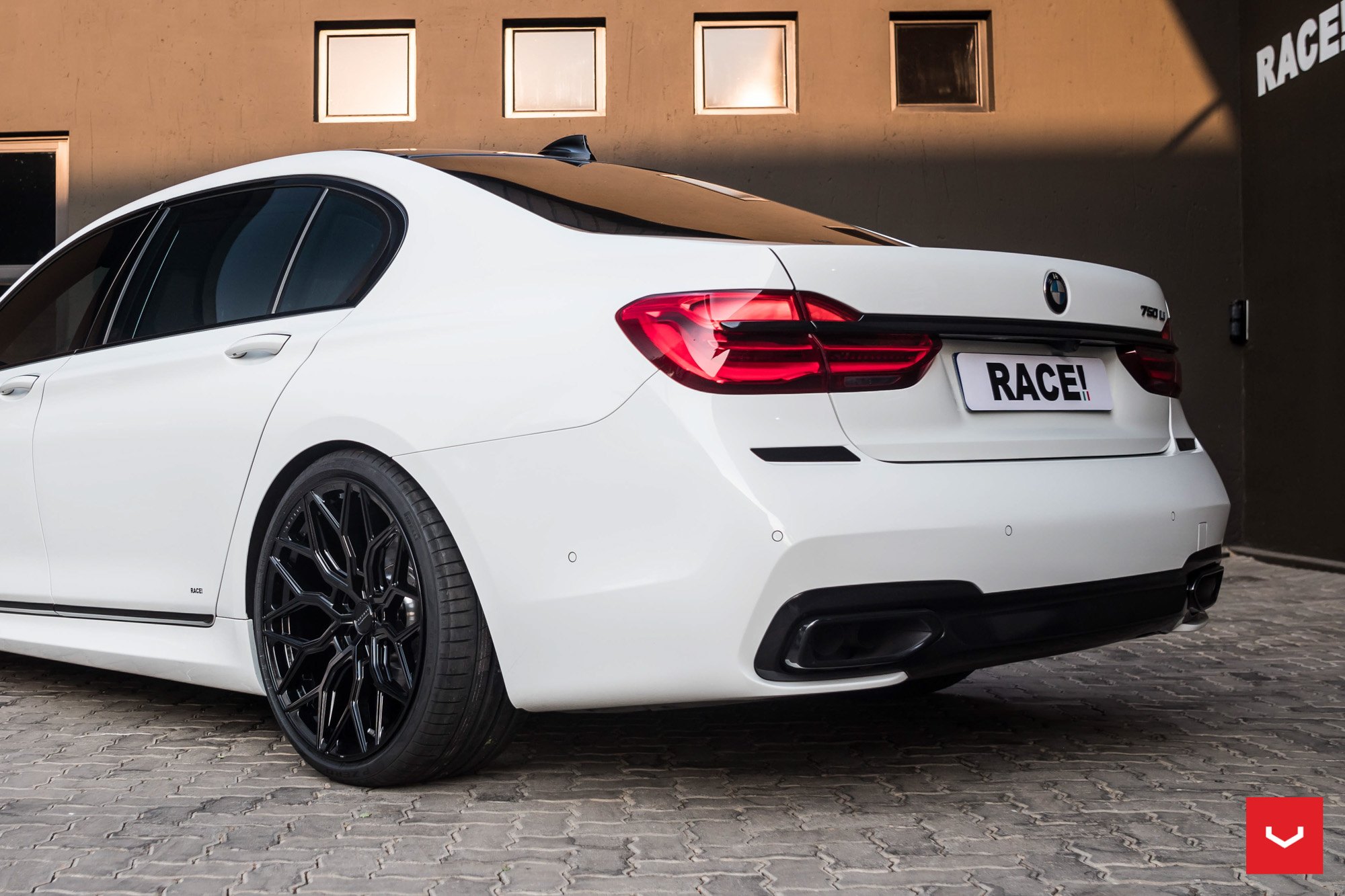 Custom Rear Diffuser on White BMW 7-Series - Photo by Vossen