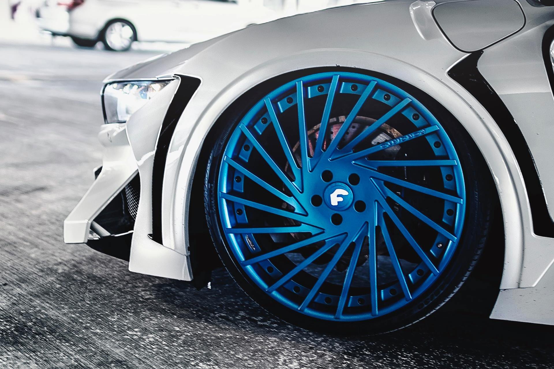 White BMW i8 with Custom Blue Forgiato Wheels - Photo by Forgiato